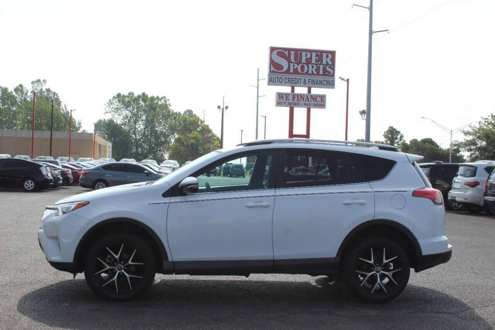 2017 White Toyota RAV4 SE FWD (2T3NFREV7HW) with an 2.5L L4 DOHC 16V engine, 6A transmission, located at 4301 NW 39th , Oklahoma City, OK, 73112, (405) 949-5600, 35.512135, -97.598671 - NO DRIVERS LICENCE NO-FULL COVERAGE INSURANCE-NO CREDIT CHECK. COME ON OVER TO SUPERSPORTS AND TAKE A LOOK AND TEST DRIVE. PLEASE GIVE US A CALL AT (405) 949-5600. NO LICENSIA DE MANEJAR- NO SEGURO DE COBERTURA TOTAL- NO VERIFICACCION DE CREDITO. POR FAVOR VENGAN A SUPERSPORTS, ECHE UN - Photo#6