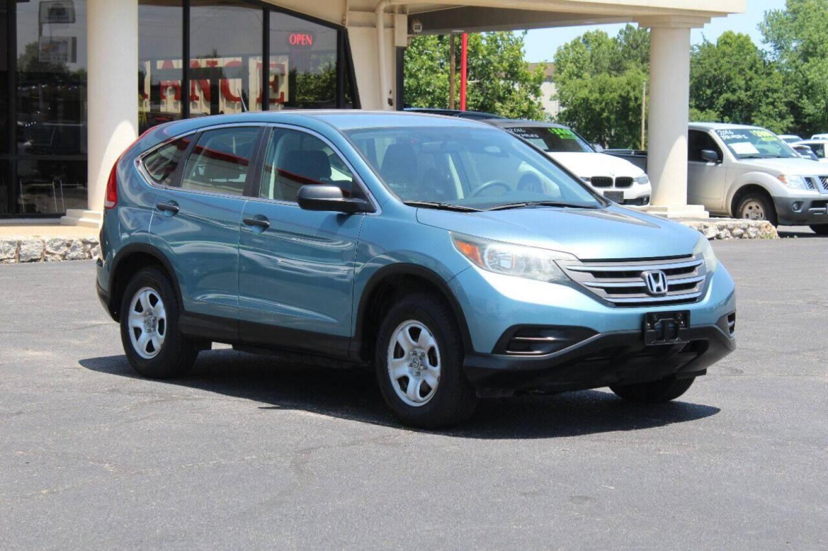 2014 Teal Honda CR-V LX 2WD 5-Speed AT (2HKRM3H33EH) with an 2.4L L4 DOHC 16V engine, 5-Speed Automatic transmission, located at 4301 NW 39th , Oklahoma City, OK, 73112, (405) 949-5600, 35.512135, -97.598671 - NO DRIVERS LICENCE NO-FULL COVERAGE INSURANCE-NO CREDIT CHECK. COME ON OVER TO SUPERSPORTS AND TAKE A LOOK AND TEST DRIVE. PLEASE GIVE US A CALL AT (405) 949-5600. NO LICENSIA DE MANEJAR- NO SEGURO DE COBERTURA TOTAL- NO VERIFICACCION DE CREDITO. POR FAVOR VENGAN A SUPERSPORTS, ECHE UN - Photo#0