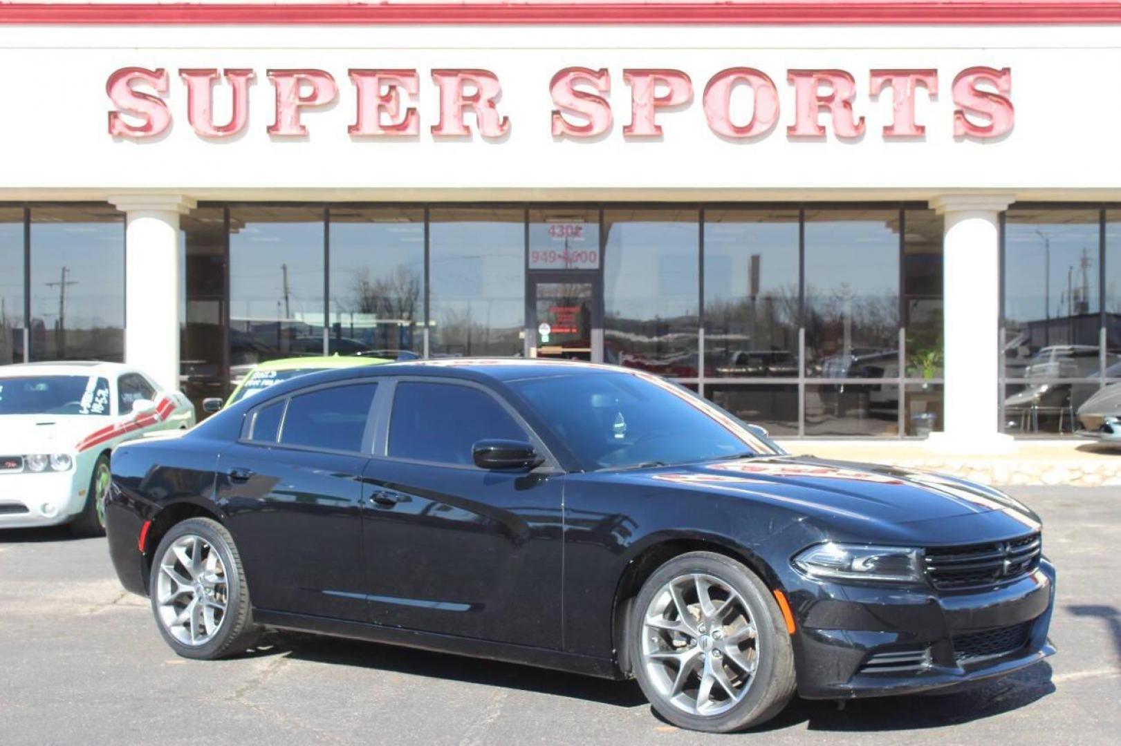 2022 Black Dodge Charger SXT (2C3CDXBG6NH) with an 3.6L V6 DOHC 24V engine, 8A transmission, located at 4301 NW 39th , Oklahoma City, OK, 73112, (405) 949-5600, 35.512135, -97.598671 - NO DRIVERS LICENCE NO-FULL COVERAGE INSURANCE-NO CREDIT CHECK. COME ON OVER TO SUPERSPORTS AND TAKE A LOOK AND TEST DRIVE. PLEASE GIVE US A CALL AT (405) 949-5600. NO LICENSIA DE MANEJAR- NO SEGURO DE COBERTURA TOTAL- NO VERIFICACCION DE CREDITO. POR FAVOR VENGAN A SUPERSPORTS, ECHE UN - Photo#0