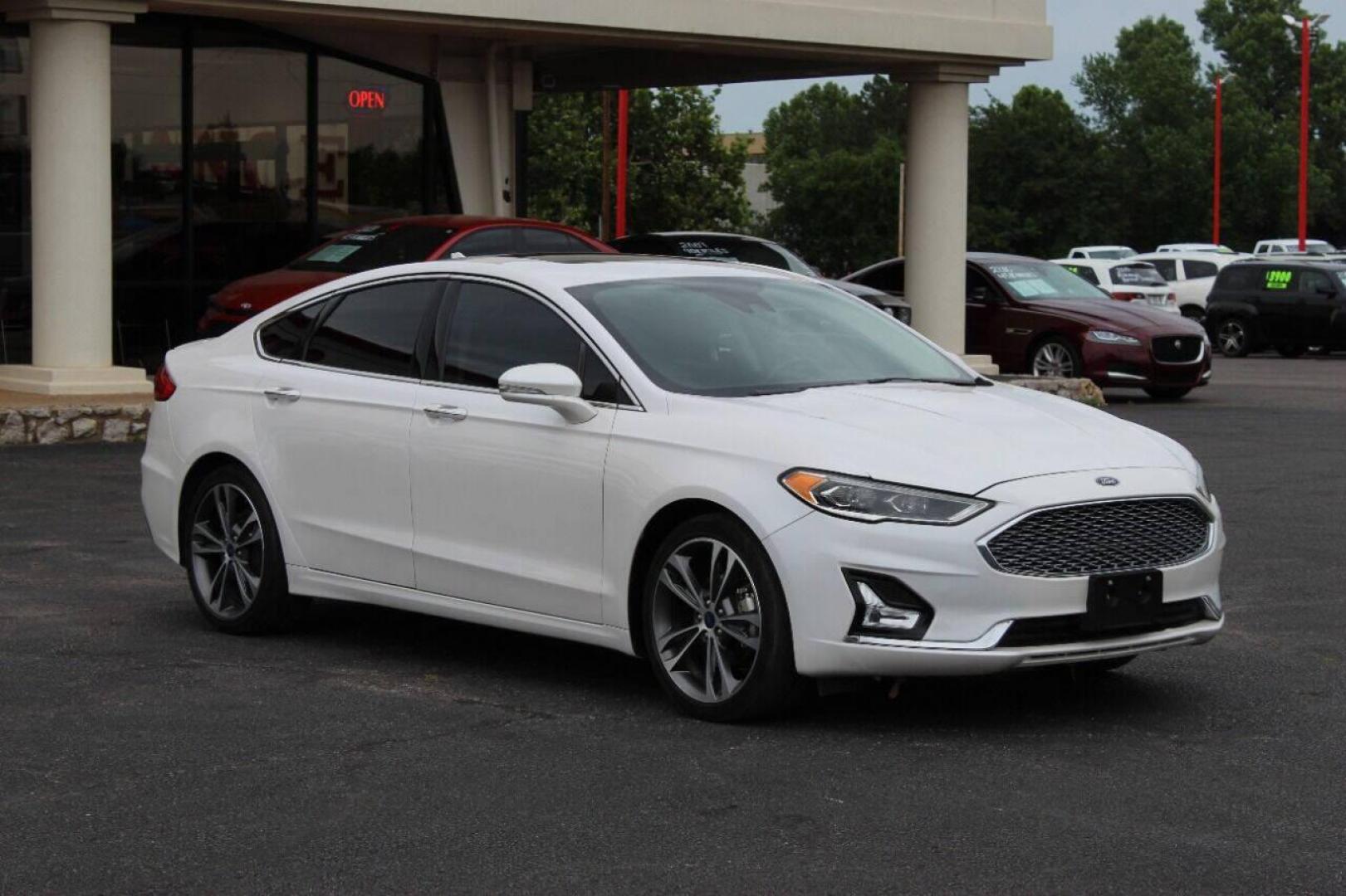 2020 White Ford Fusion Titanium (3FA6P0K93LR) with an 2.0L L4 DOHC 16V engine, 6A transmission, located at 4301 NW 39th , Oklahoma City, OK, 73112, (405) 949-5600, 35.512135, -97.598671 - NO DRIVERS LICENSE - NO FULL COVERAGE INSURANCE - NO CREDIT CHECK. COME ON OVER TO SUPERSPORTS AND TAKE A LOOK AND TEST DRIVE PLEASE GIVE US A CALL AT (405) 949-5600. NO LICENCIA DE MANEJAR - NO SEGURO DE COBERTURA TOTAL - NO VERIFICACION DE CREDITO. POR FAVOR VENGAN A SUPERSPORTS, ECHE - Photo#2