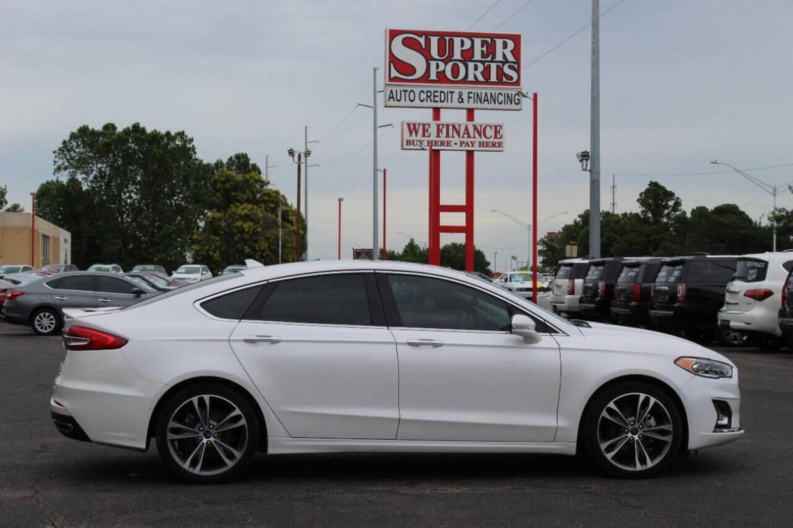 2020 White Ford Fusion Titanium (3FA6P0K93LR) with an 2.0L L4 DOHC 16V engine, 6A transmission, located at 4301 NW 39th , Oklahoma City, OK, 73112, (405) 949-5600, 35.512135, -97.598671 - NO DRIVERS LICENSE - NO FULL COVERAGE INSURANCE - NO CREDIT CHECK. COME ON OVER TO SUPERSPORTS AND TAKE A LOOK AND TEST DRIVE PLEASE GIVE US A CALL AT (405) 949-5600. NO LICENCIA DE MANEJAR - NO SEGURO DE COBERTURA TOTAL - NO VERIFICACION DE CREDITO. POR FAVOR VENGAN A SUPERSPORTS, ECHE - Photo#3