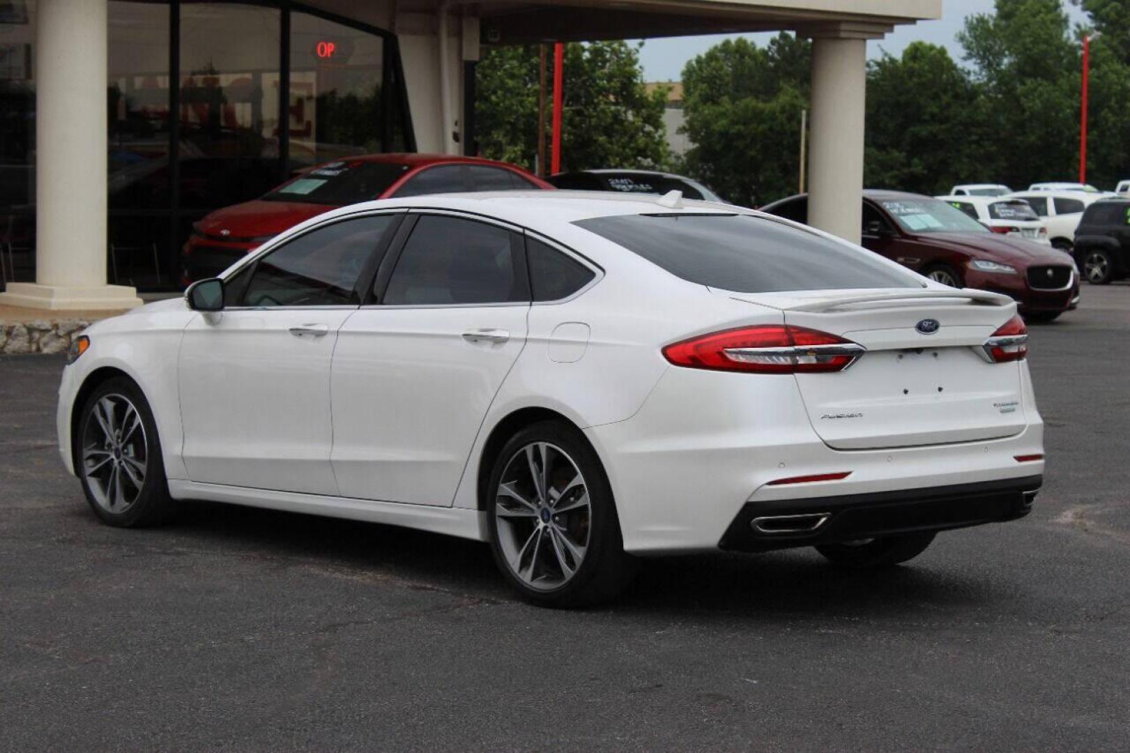 2020 White Ford Fusion Titanium (3FA6P0K93LR) with an 2.0L L4 DOHC 16V engine, 6A transmission, located at 4301 NW 39th , Oklahoma City, OK, 73112, (405) 949-5600, 35.512135, -97.598671 - NO DRIVERS LICENSE - NO FULL COVERAGE INSURANCE - NO CREDIT CHECK. COME ON OVER TO SUPERSPORTS AND TAKE A LOOK AND TEST DRIVE PLEASE GIVE US A CALL AT (405) 949-5600. NO LICENCIA DE MANEJAR - NO SEGURO DE COBERTURA TOTAL - NO VERIFICACION DE CREDITO. POR FAVOR VENGAN A SUPERSPORTS, ECHE - Photo#5