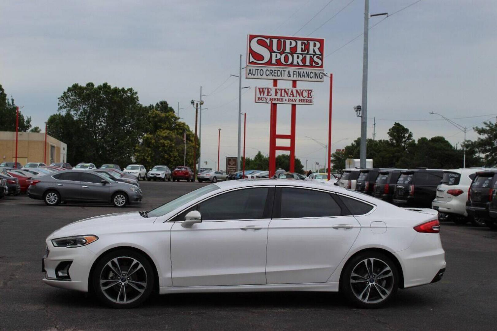 2020 White Ford Fusion Titanium (3FA6P0K93LR) with an 2.0L L4 DOHC 16V engine, 6A transmission, located at 4301 NW 39th , Oklahoma City, OK, 73112, (405) 949-5600, 35.512135, -97.598671 - NO DRIVERS LICENSE - NO FULL COVERAGE INSURANCE - NO CREDIT CHECK. COME ON OVER TO SUPERSPORTS AND TAKE A LOOK AND TEST DRIVE PLEASE GIVE US A CALL AT (405) 949-5600. NO LICENCIA DE MANEJAR - NO SEGURO DE COBERTURA TOTAL - NO VERIFICACION DE CREDITO. POR FAVOR VENGAN A SUPERSPORTS, ECHE - Photo#6