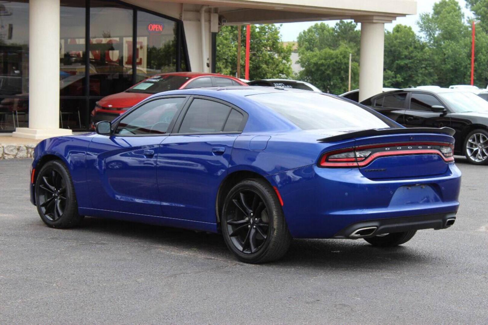 2018 Blue Dodge Charger SE (2C3CDXBG9JH) with an 3.6L V6 DOHC 24V engine, 8A transmission, located at 4301 NW 39th , Oklahoma City, OK, 73112, (405) 949-5600, 35.512135, -97.598671 - NO DRIVERS LICENSE - NO FULL COVERAGE INSURANCE - NO CREDIT CHECK. COME ON OVER TO SUPERSPORTS AND TAKE A LOOK AND TEST DRIVE PLEASE GIVE US A CALL AT (405) 949-5600. NO LICENCIA DE MANEJAR - NO SEGURO DE COBERTURA TOTAL - NO VERIFICACION DE CREDITO. POR FAVOR VENGAN A SUPERSPORTS, ECHE - Photo#5