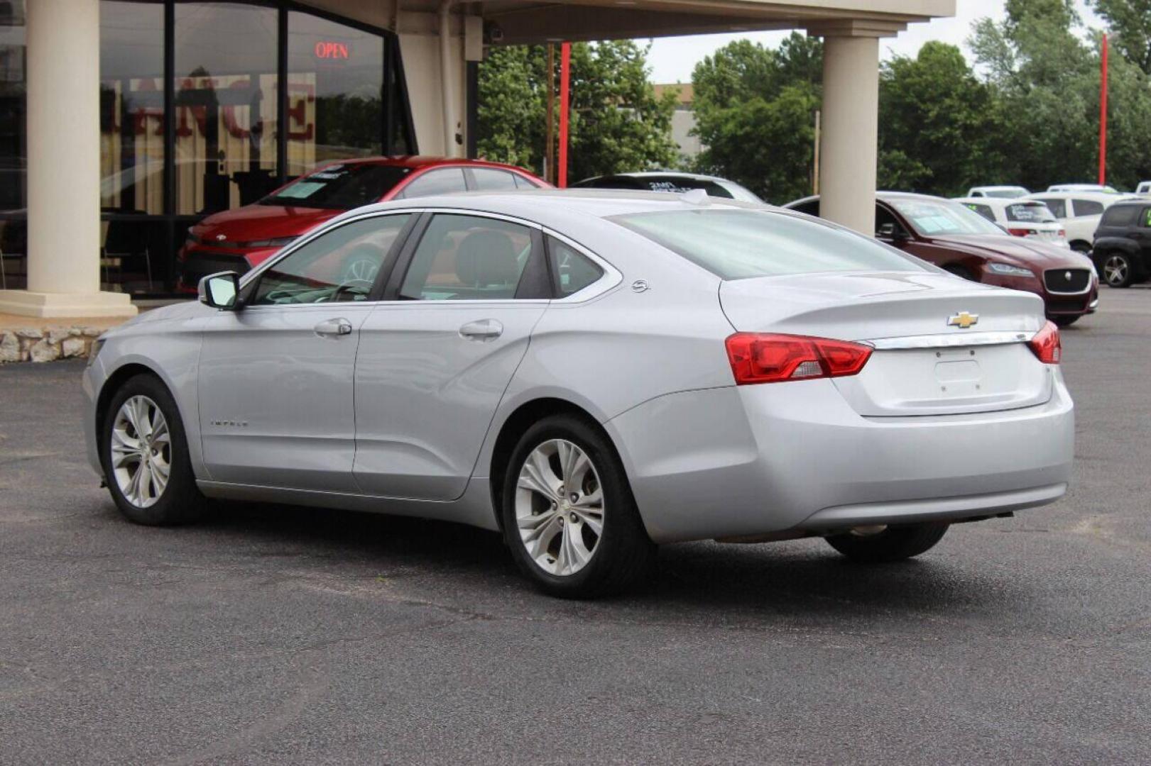 2014 Silver Chevrolet Impala 2LT (2G1125S33E9) with an 3.6L V6 DOHC 16V FFV engine, 6-Speed Automatic transmission, located at 4301 NW 39th , Oklahoma City, OK, 73112, (405) 949-5600, 35.512135, -97.598671 - NO DRIVERS LICENCE NO-FULL COVERAGE INSURANCE-NO CREDIT CHECK. COME ON OVER TO SUPERSPORTS AND TAKE A LOOK AND TEST DRIVE PLEASE GIVE US A CALL AT (405) 949-5600. NO LICENSIA DE MANEJAR- NO SEGURO DE COBERTURA TOTAL- NO VERIFICACCION DE CREDITO. POR FAVOR VENGAN A SUPERSPORT - Photo#5