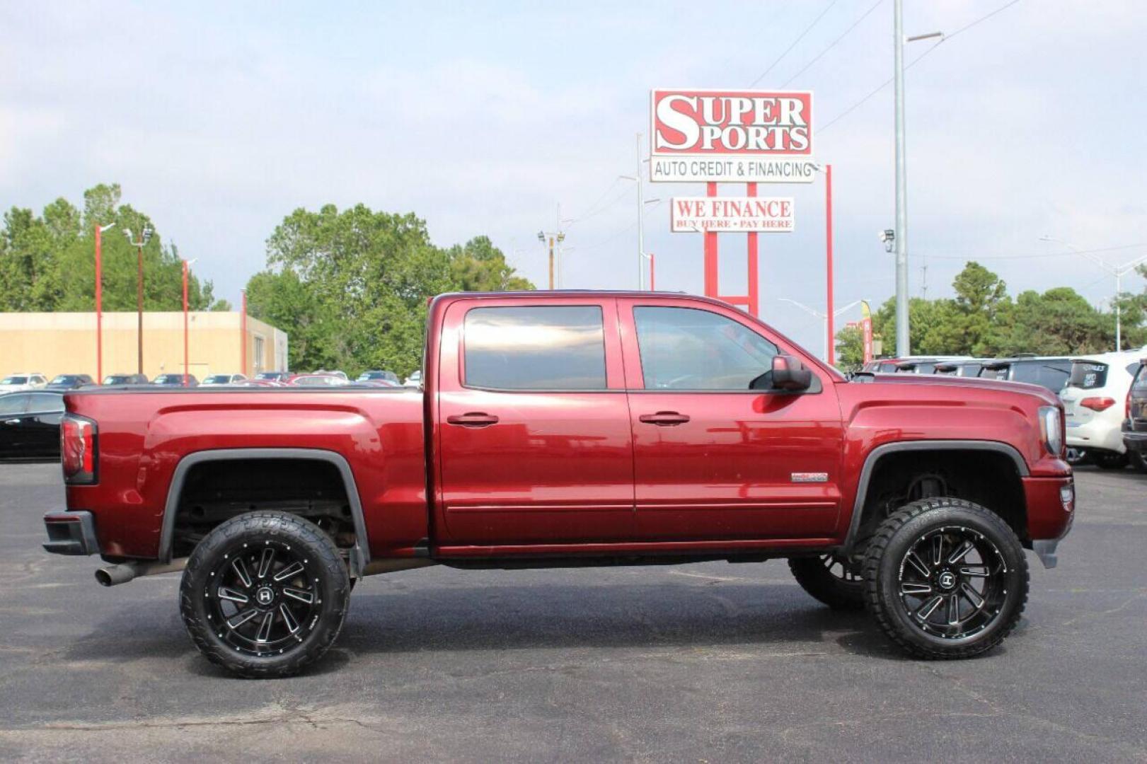 2017 Maroon GMC Sierra 1500 SLT Crew Cab Long Box 4WD (3GTU2NEC4HG) with an 5.3L V8 OHV 16V engine, 6A transmission, located at 4301 NW 39th , Oklahoma City, OK, 73112, (405) 949-5600, 35.512135, -97.598671 - NO DRIVERS LICENCE NO-FULL COVERAGE INSURANCE-NO CREDIT CHECK. COME ON OVER TO SUPERSPORTS AND TAKE A LOOK AND TEST DRIVE. PLEASE GIVE US A CALL AT (405) 949-5600. NO LICENSIA DE MANEJAR- NO SEGURO DE COBERTURA TOTAL- NO VERIFICACCION DE CREDITO. POR FAVOR VENGAN A SUPERSPORTS, ECHE UN - Photo#3