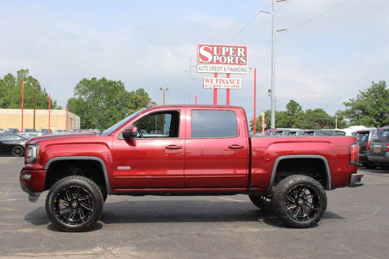 2017 Maroon GMC Sierra 1500 SLT Crew Cab Long Box 4WD (3GTU2NEC4HG) with an 5.3L V8 OHV 16V engine, 6A transmission, located at 4301 NW 39th , Oklahoma City, OK, 73112, (405) 949-5600, 35.512135, -97.598671 - NO DRIVERS LICENCE NO-FULL COVERAGE INSURANCE-NO CREDIT CHECK. COME ON OVER TO SUPERSPORTS AND TAKE A LOOK AND TEST DRIVE. PLEASE GIVE US A CALL AT (405) 949-5600. NO LICENSIA DE MANEJAR- NO SEGURO DE COBERTURA TOTAL- NO VERIFICACCION DE CREDITO. POR FAVOR VENGAN A SUPERSPORTS, ECHE UN - Photo#6