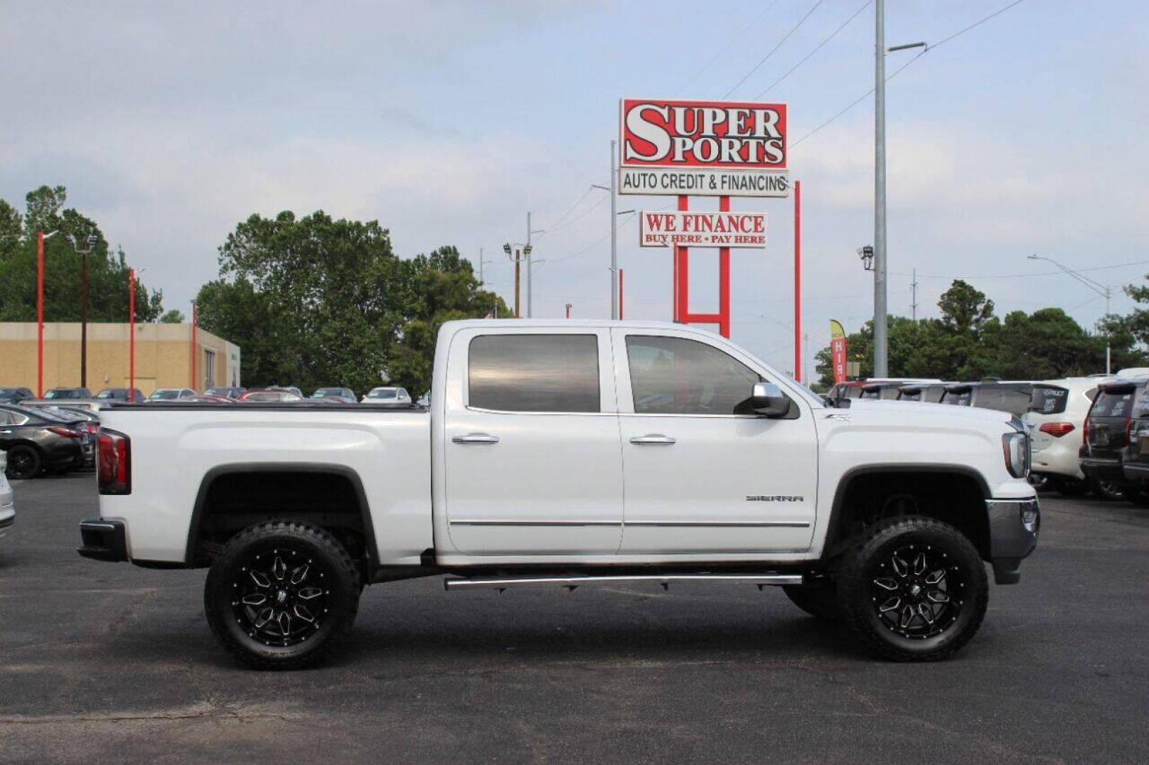 2016 White GMC Sierra 1500 SLT Crew Cab Long Box 4WD (3GTU2NEC6GG) with an 5.3L V8 OHV 16V engine, 6A transmission, located at 4301 NW 39th , Oklahoma City, OK, 73112, (405) 949-5600, 35.512135, -97.598671 - NO DRIVERS LICENCE NO-FULL COVERAGE INSURANCE-NO CREDIT CHECK. COME ON OVER TO SUPERSPORTS AND TAKE A LOOK AND TEST DRIVE. PLEASE GIVE US A CALL AT (405) 949-5600. NO LICENSIA DE MANEJAR- NO SEGURO DE COBERTURA TOTAL- NO VERIFICACCION DE CREDITO. POR FAVOR VENGAN A SUPERSPORTS, ECHE UN - Photo#3