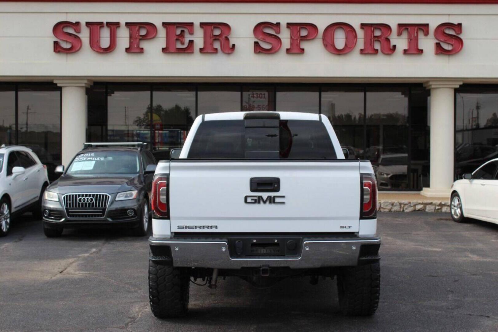 2016 White GMC Sierra 1500 SLT Crew Cab Long Box 4WD (3GTU2NEC6GG) with an 5.3L V8 OHV 16V engine, 6A transmission, located at 4301 NW 39th , Oklahoma City, OK, 73112, (405) 949-5600, 35.512135, -97.598671 - NO DRIVERS LICENCE NO-FULL COVERAGE INSURANCE-NO CREDIT CHECK. COME ON OVER TO SUPERSPORTS AND TAKE A LOOK AND TEST DRIVE. PLEASE GIVE US A CALL AT (405) 949-5600. NO LICENSIA DE MANEJAR- NO SEGURO DE COBERTURA TOTAL- NO VERIFICACCION DE CREDITO. POR FAVOR VENGAN A SUPERSPORTS, ECHE UN - Photo#4