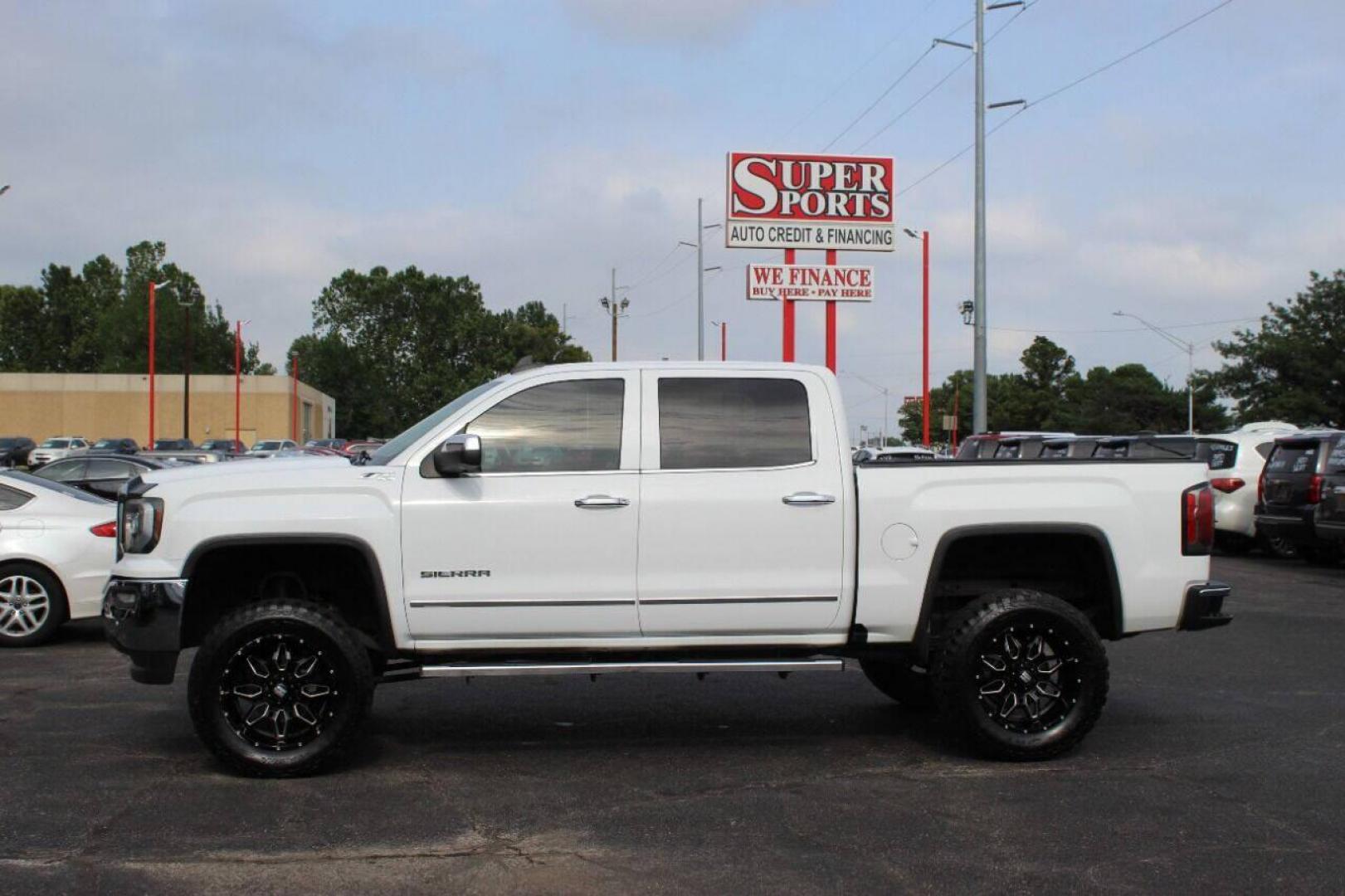 2016 White GMC Sierra 1500 SLT Crew Cab Long Box 4WD (3GTU2NEC6GG) with an 5.3L V8 OHV 16V engine, 6A transmission, located at 4301 NW 39th , Oklahoma City, OK, 73112, (405) 949-5600, 35.512135, -97.598671 - NO DRIVERS LICENCE NO-FULL COVERAGE INSURANCE-NO CREDIT CHECK. COME ON OVER TO SUPERSPORTS AND TAKE A LOOK AND TEST DRIVE. PLEASE GIVE US A CALL AT (405) 949-5600. NO LICENSIA DE MANEJAR- NO SEGURO DE COBERTURA TOTAL- NO VERIFICACCION DE CREDITO. POR FAVOR VENGAN A SUPERSPORTS, ECHE UN - Photo#6