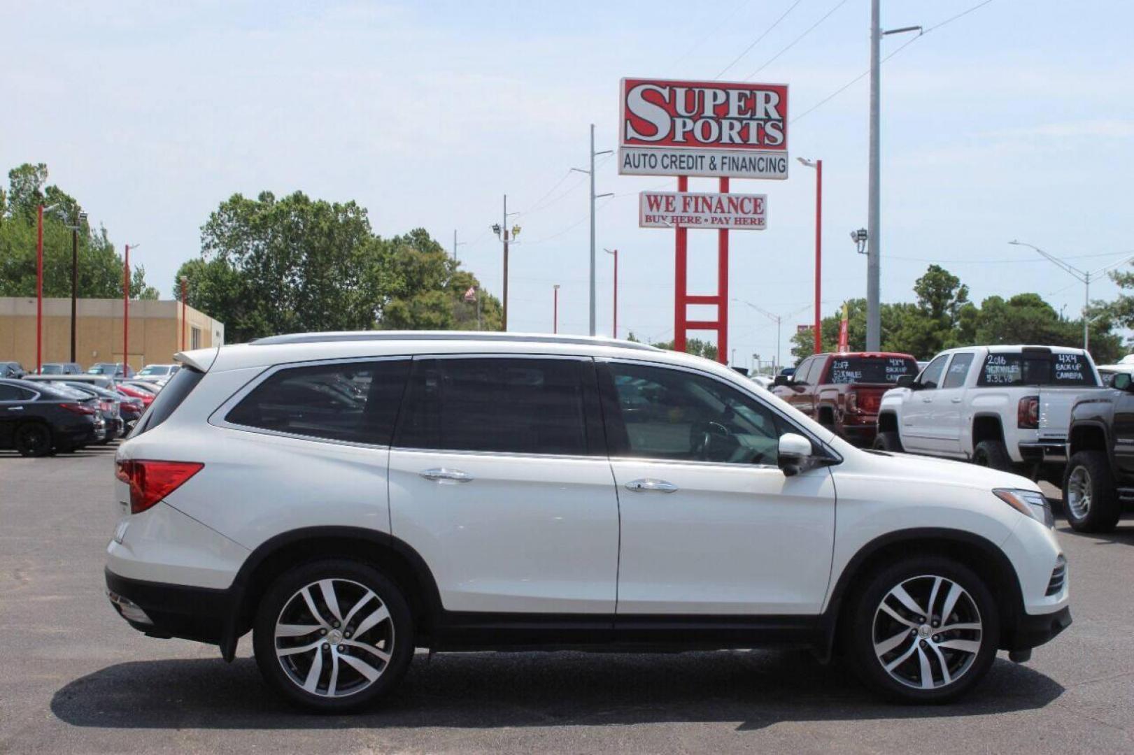 2017 White Honda Pilot Touring 2WD (5FNYF5H96HB) with an 3.5L V6 SOHC 24V engine, 9A transmission, located at 4301 NW 39th , Oklahoma City, OK, 73112, (405) 949-5600, 35.512135, -97.598671 - Photo#3