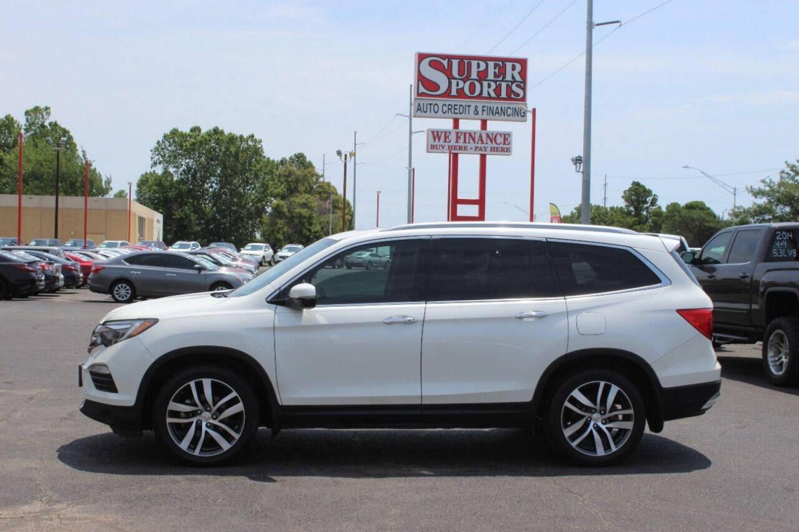 2017 White Honda Pilot Touring 2WD (5FNYF5H96HB) with an 3.5L V6 SOHC 24V engine, 9A transmission, located at 4301 NW 39th , Oklahoma City, OK, 73112, (405) 949-5600, 35.512135, -97.598671 - Photo#6