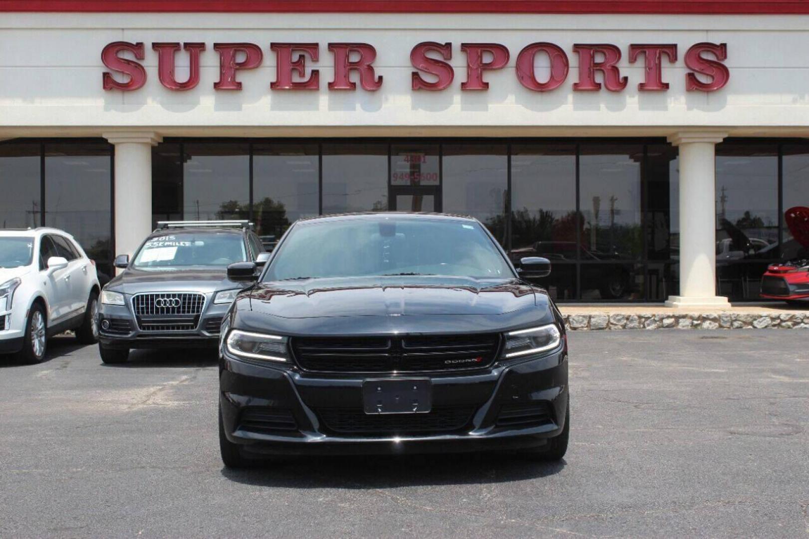 2019 Black Dodge Charger SXT (2C3CDXBGXKH) with an 3.6L V6 DOHC 24V engine, 8A transmission, located at 4301 NW 39th , Oklahoma City, OK, 73112, (405) 949-5600, 35.512135, -97.598671 - NO DRIVERS LICENCE NO-FULL COVERAGE INSURANCE-NO CREDIT CHECK. COME ON OVER TO SUPERSPORTS AND TAKE A LOOK AND TEST DRIVE PLEASE GIVE US A CALL AT (405) 949-5600. NO LICENSIA DE MANEJAR- NO SEGURO DE COBERTURA TOTAL- NO VERIFICACCION DE CREDITO. POR FAVOR VENGAN A SUPERSPORTS, ECHE UN VI - Photo#0