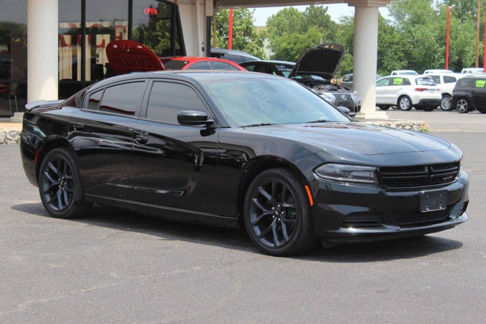 2019 Black Dodge Charger SXT (2C3CDXBGXKH) with an 3.6L V6 DOHC 24V engine, 8A transmission, located at 4301 NW 39th , Oklahoma City, OK, 73112, (405) 949-5600, 35.512135, -97.598671 - NO DRIVERS LICENCE NO-FULL COVERAGE INSURANCE-NO CREDIT CHECK. COME ON OVER TO SUPERSPORTS AND TAKE A LOOK AND TEST DRIVE PLEASE GIVE US A CALL AT (405) 949-5600. NO LICENSIA DE MANEJAR- NO SEGURO DE COBERTURA TOTAL- NO VERIFICACCION DE CREDITO. POR FAVOR VENGAN A SUPERSPORTS, ECHE UN VI - Photo#2