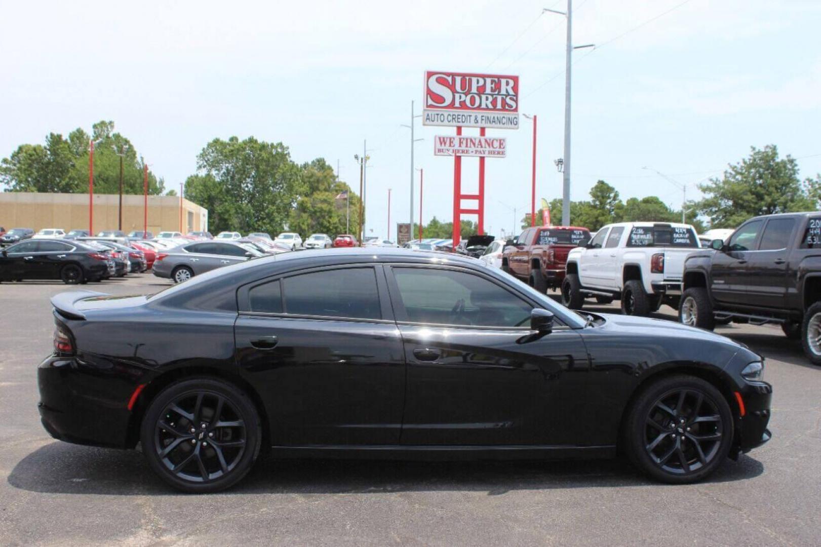 2019 Black Dodge Charger SXT (2C3CDXBGXKH) with an 3.6L V6 DOHC 24V engine, 8A transmission, located at 4301 NW 39th , Oklahoma City, OK, 73112, (405) 949-5600, 35.512135, -97.598671 - NO DRIVERS LICENCE NO-FULL COVERAGE INSURANCE-NO CREDIT CHECK. COME ON OVER TO SUPERSPORTS AND TAKE A LOOK AND TEST DRIVE PLEASE GIVE US A CALL AT (405) 949-5600. NO LICENSIA DE MANEJAR- NO SEGURO DE COBERTURA TOTAL- NO VERIFICACCION DE CREDITO. POR FAVOR VENGAN A SUPERSPORTS, ECHE UN VI - Photo#3