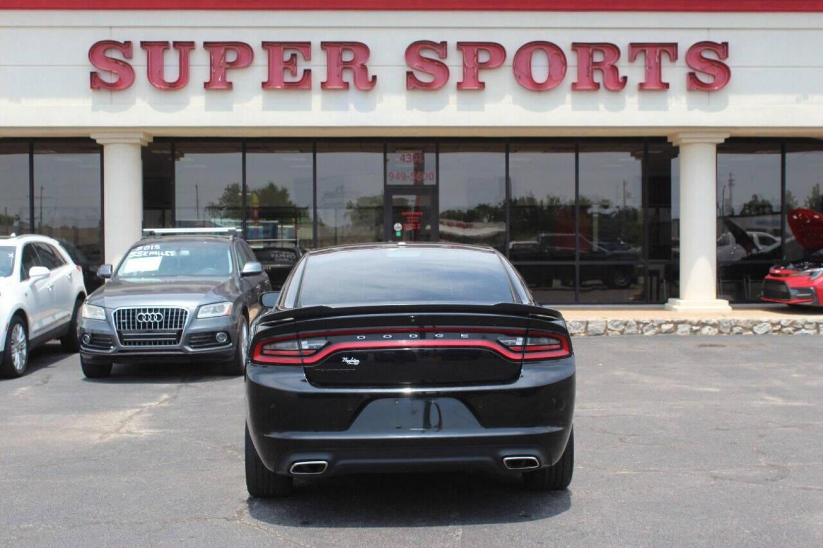 2019 Black Dodge Charger SXT (2C3CDXBGXKH) with an 3.6L V6 DOHC 24V engine, 8A transmission, located at 4301 NW 39th , Oklahoma City, OK, 73112, (405) 949-5600, 35.512135, -97.598671 - NO DRIVERS LICENCE NO-FULL COVERAGE INSURANCE-NO CREDIT CHECK. COME ON OVER TO SUPERSPORTS AND TAKE A LOOK AND TEST DRIVE PLEASE GIVE US A CALL AT (405) 949-5600. NO LICENSIA DE MANEJAR- NO SEGURO DE COBERTURA TOTAL- NO VERIFICACCION DE CREDITO. POR FAVOR VENGAN A SUPERSPORTS, ECHE UN VI - Photo#4