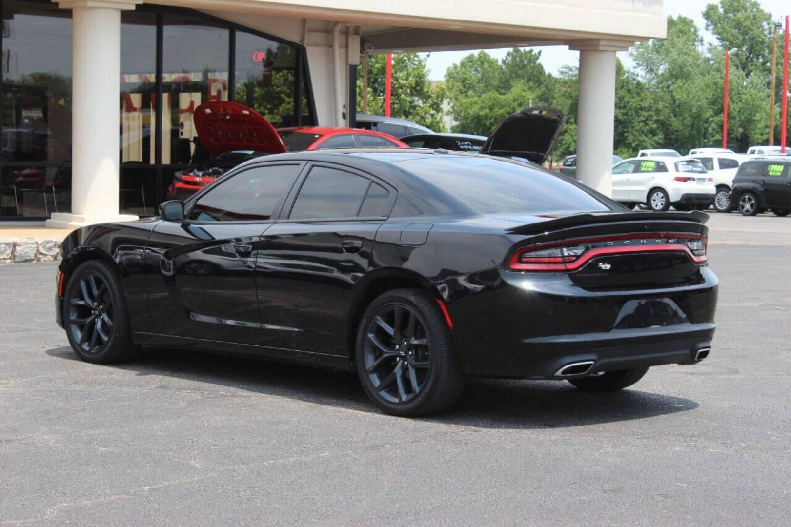 2019 Black Dodge Charger SXT (2C3CDXBGXKH) with an 3.6L V6 DOHC 24V engine, 8A transmission, located at 4301 NW 39th , Oklahoma City, OK, 73112, (405) 949-5600, 35.512135, -97.598671 - NO DRIVERS LICENCE NO-FULL COVERAGE INSURANCE-NO CREDIT CHECK. COME ON OVER TO SUPERSPORTS AND TAKE A LOOK AND TEST DRIVE PLEASE GIVE US A CALL AT (405) 949-5600. NO LICENSIA DE MANEJAR- NO SEGURO DE COBERTURA TOTAL- NO VERIFICACCION DE CREDITO. POR FAVOR VENGAN A SUPERSPORTS, ECHE UN VI - Photo#5