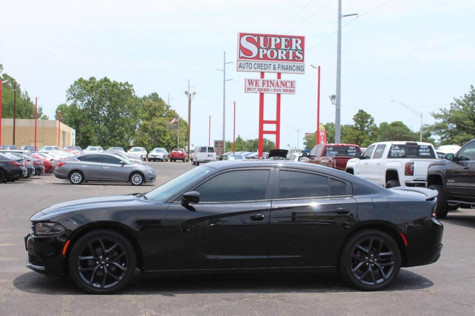 2019 Black Dodge Charger SXT (2C3CDXBGXKH) with an 3.6L V6 DOHC 24V engine, 8A transmission, located at 4301 NW 39th , Oklahoma City, OK, 73112, (405) 949-5600, 35.512135, -97.598671 - NO DRIVERS LICENCE NO-FULL COVERAGE INSURANCE-NO CREDIT CHECK. COME ON OVER TO SUPERSPORTS AND TAKE A LOOK AND TEST DRIVE PLEASE GIVE US A CALL AT (405) 949-5600. NO LICENSIA DE MANEJAR- NO SEGURO DE COBERTURA TOTAL- NO VERIFICACCION DE CREDITO. POR FAVOR VENGAN A SUPERSPORTS, ECHE UN VI - Photo#6