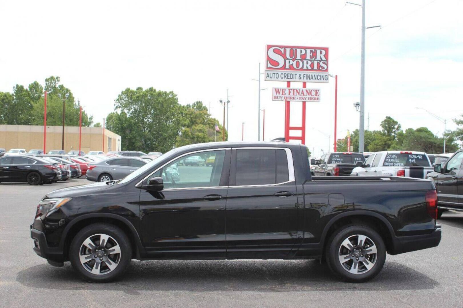 2017 Black Honda Ridgeline RTL-T (5FPYK2F61HB) with an 3.5L V6 SOHC 24V engine, 6A transmission, located at 4301 NW 39th , Oklahoma City, OK, 73112, (405) 949-5600, 35.512135, -97.598671 - NO DRIVERS LICENCE NO-FULL COVERAGE INSURANCE-NO CREDIT CHECK. COME ON OVER TO SUPERSPORTS AND TAKE A LOOK AND TEST DRIVE. PLEASE GIVE US A CALL AT (405) 949-5600. NO LICENSIA DE MANEJAR- NO SEGURO DE COBERTURA TOTAL- NO VERIFICACCION DE CREDITO. POR FAVOR VENGAN A SUPERSPORTS, ECHE UN - Photo#6