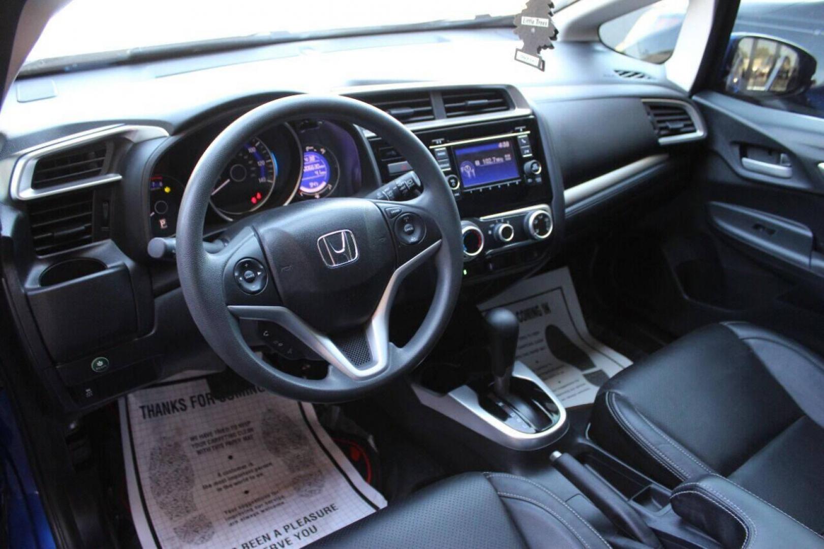 2015 Blue Honda Fit LX CVT (3HGGK5H5XFM) with an 1.5L L4 SOHC 16V engine, Continuously Variable Transmission transmission, located at 4301 NW 39th , Oklahoma City, OK, 73112, (405) 949-5600, 35.512135, -97.598671 - NO DRIVERS LICENCE NO-FULL COVERAGE INSURANCE-NO CREDIT CHECK. COME ON OVER TO SUPERSPORTS AND TAKE A LOOK AND TEST DRIVE. PLEASE GIVE US A CALL AT (405) 949-5600. NO LICENSIA DE MANEJAR- NO SEGURO DE COBERTURA TOTAL- NO VERIFICACCION DE CREDITO. POR FAVOR VENGAN A SUPERSPORTS, ECHE UN - Photo#15