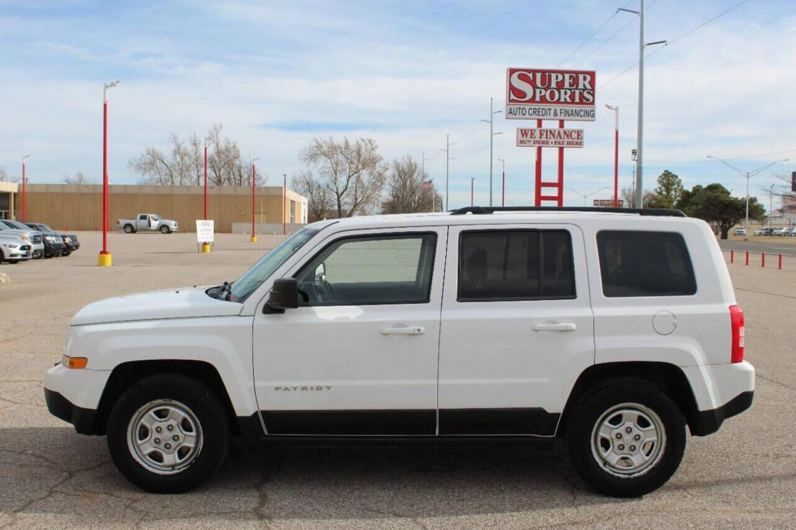 2014 White Jeep Patriot Sport 2WD (1C4NJPBB7ED) with an 2.4L L4 DOHC 16V engine, Automatic 6-Speed transmission, located at 4301 NW 39th , Oklahoma City, OK, 73112, (405) 949-5600, 35.512135, -97.598671 - NO DRIVERS LICENCE NO-FULL COVERAGE INSURANCE-NO CREDIT CHECK. COME ON OVER TO SUPERSPORTS AND TAKE A LOOK AND TEST DRIVE. PLEASE GIVE US A CALL AT (405) 949-5600. NO LICENSIA DE MANEJAR- NO SEGURO DE COBERTURA TOTAL- NO VERIFICACCION DE CREDITO. POR FAVOR VENGAN A SUPERSPORTS, ECHE UN - Photo#6