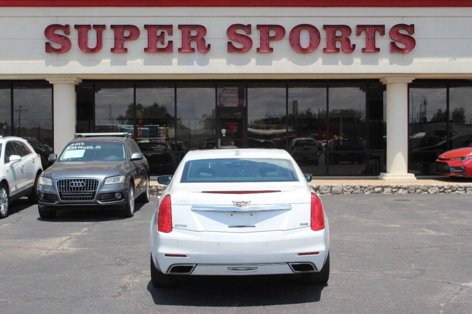 2015 White Cadillac CTS 3.6L Performance RWD (1G6AS5S36F0) with an 3.6L V6 DOHC 24V engine, 8A transmission, located at 4301 NW 39th , Oklahoma City, OK, 73112, (405) 949-5600, 35.512135, -97.598671 - NO DRIVERS LICENCE NO-FULL COVERAGE INSURANCE-NO CREDIT CHECK. COME ON OVER TO SUPERSPORTS AND TAKE A LOOK AND TEST DRIVE. PLEASE GIVE US A CALL AT (405) 949-5600. NO LICENSIA DE MANEJAR- NO SEGURO DE COBERTURA TOTAL- NO VERIFICACCION DE CREDITO. POR FAVOR VENGAN A SUPERSPORTS, ECHE UN - Photo#4