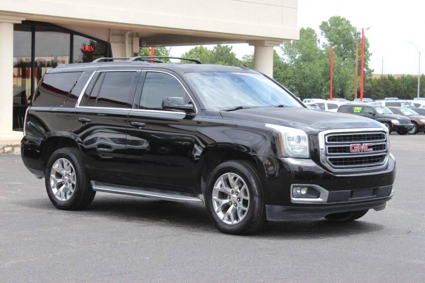 2015 Black GMC Yukon SLT 2WD (1GKS1BKCXFR) with an 5.3L V8 OHV 16V engine, 6-Speed Automatic transmission, located at 4301 NW 39th , Oklahoma City, OK, 73112, (405) 949-5600, 35.512135, -97.598671 - NO DRIVERS LICENCE NO-FULL COVERAGE INSURANCE-NO CREDIT CHECK. COME ON OVER TO SUPERSPORTS AND TAKE A LOOK AND TEST DRIVE. PLEASE GIVE US A CALL AT (405) 949-5600. NO LICENSIA DE MANEJAR- NO SEGURO DE COBERTURA TOTAL- NO VERIFICACCION DE CREDITO. POR FAVOR VENGAN A SUPERSPORTS, ECHE UN - Photo#0