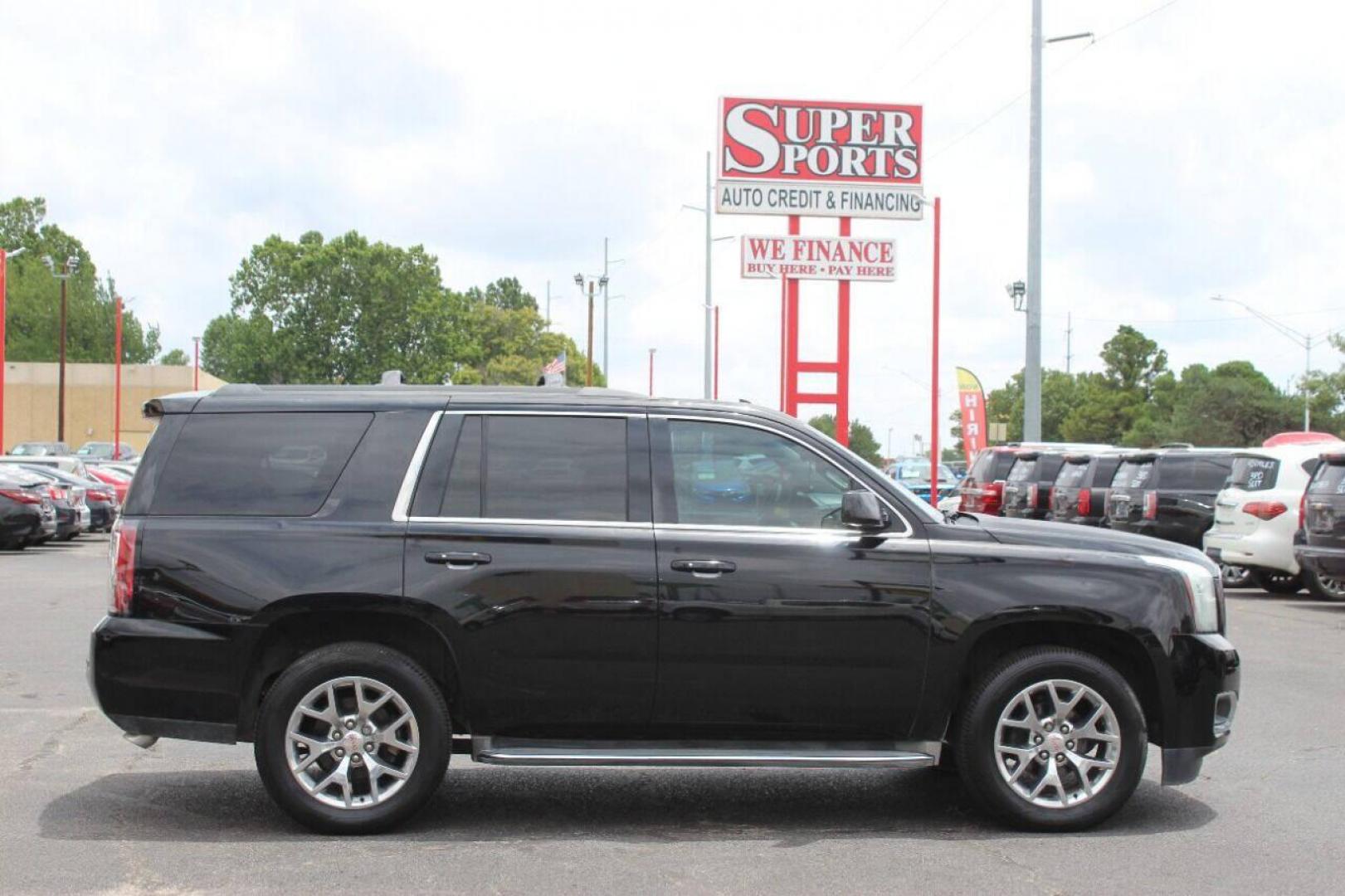 2015 Black GMC Yukon SLT 2WD (1GKS1BKCXFR) with an 5.3L V8 OHV 16V engine, 6-Speed Automatic transmission, located at 4301 NW 39th , Oklahoma City, OK, 73112, (405) 949-5600, 35.512135, -97.598671 - NO DRIVERS LICENCE NO-FULL COVERAGE INSURANCE-NO CREDIT CHECK. COME ON OVER TO SUPERSPORTS AND TAKE A LOOK AND TEST DRIVE. PLEASE GIVE US A CALL AT (405) 949-5600. NO LICENSIA DE MANEJAR- NO SEGURO DE COBERTURA TOTAL- NO VERIFICACCION DE CREDITO. POR FAVOR VENGAN A SUPERSPORTS, ECHE UN - Photo#3