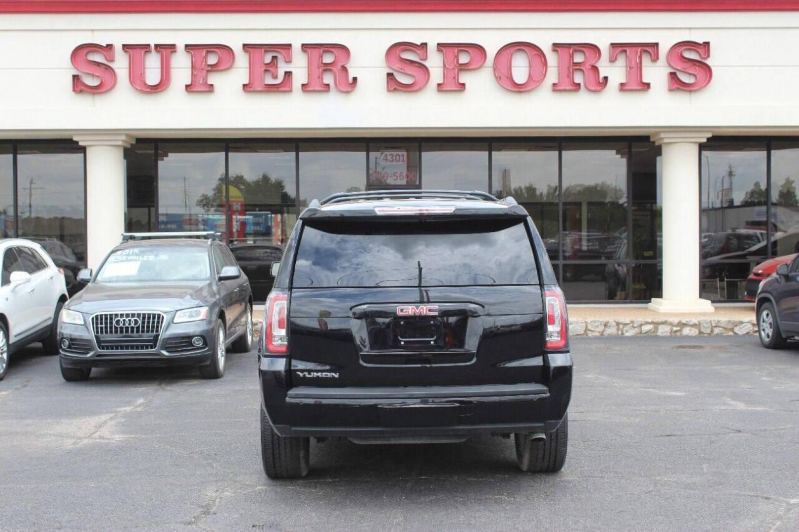 2015 Black GMC Yukon SLT 2WD (1GKS1BKCXFR) with an 5.3L V8 OHV 16V engine, 6-Speed Automatic transmission, located at 4301 NW 39th , Oklahoma City, OK, 73112, (405) 949-5600, 35.512135, -97.598671 - NO DRIVERS LICENCE NO-FULL COVERAGE INSURANCE-NO CREDIT CHECK. COME ON OVER TO SUPERSPORTS AND TAKE A LOOK AND TEST DRIVE. PLEASE GIVE US A CALL AT (405) 949-5600. NO LICENSIA DE MANEJAR- NO SEGURO DE COBERTURA TOTAL- NO VERIFICACCION DE CREDITO. POR FAVOR VENGAN A SUPERSPORTS, ECHE UN - Photo#4