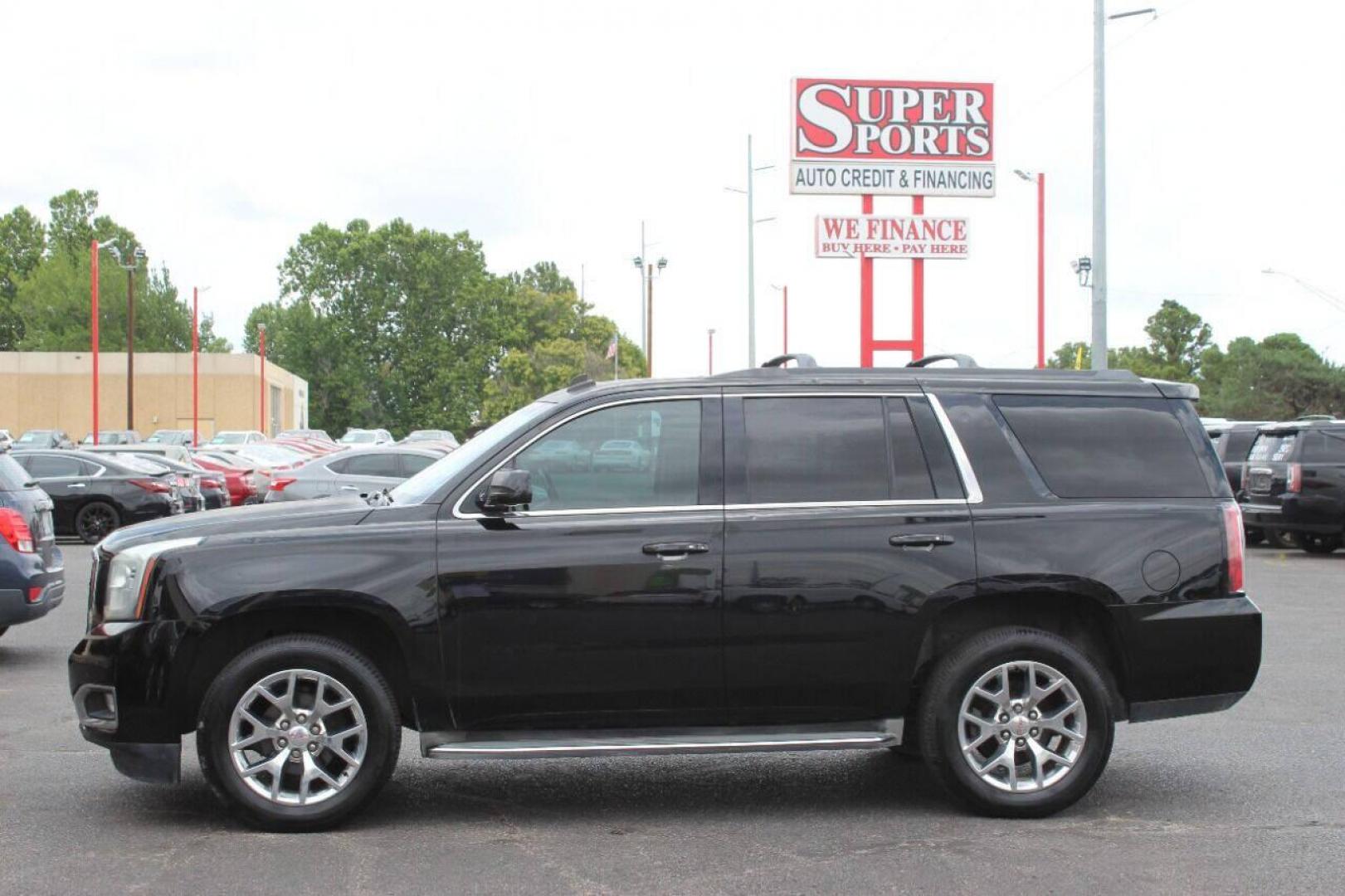 2015 Black GMC Yukon SLT 2WD (1GKS1BKCXFR) with an 5.3L V8 OHV 16V engine, 6-Speed Automatic transmission, located at 4301 NW 39th , Oklahoma City, OK, 73112, (405) 949-5600, 35.512135, -97.598671 - NO DRIVERS LICENCE NO-FULL COVERAGE INSURANCE-NO CREDIT CHECK. COME ON OVER TO SUPERSPORTS AND TAKE A LOOK AND TEST DRIVE. PLEASE GIVE US A CALL AT (405) 949-5600. NO LICENSIA DE MANEJAR- NO SEGURO DE COBERTURA TOTAL- NO VERIFICACCION DE CREDITO. POR FAVOR VENGAN A SUPERSPORTS, ECHE UN - Photo#6