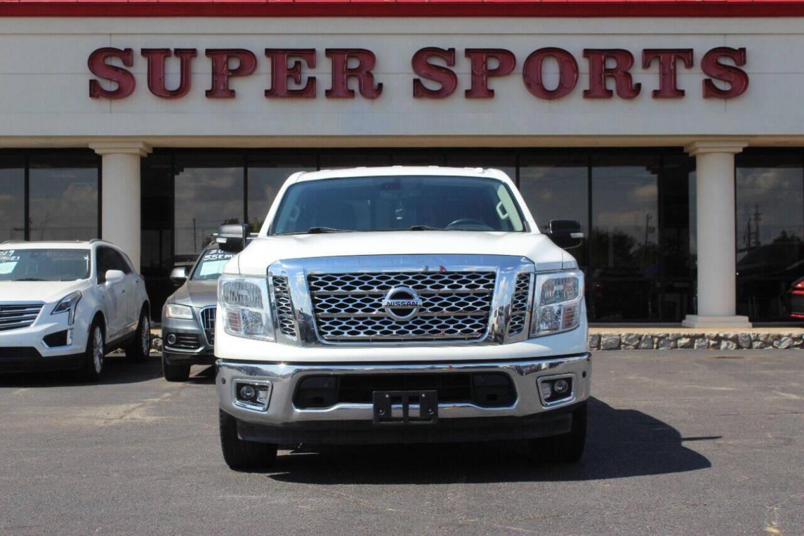 2018 White Nissan Titan Platinum Reserve Crew Cab 2WD (1N6AA1E68JN) with an 5.6L V8 DOHC 32V engine, 6A transmission, located at 4301 NW 39th , Oklahoma City, OK, 73112, (405) 949-5600, 35.512135, -97.598671 - NO DRIVERS LICENCE NO-FULL COVERAGE INSURANCE-NO CREDIT CHECK. COME ON OVER TO SUPERSPORTS AND TAKE A LOOK AND TEST DRIVE. PLEASE GIVE US A CALL AT (405) 949-5600. NO LICENSIA DE MANEJAR- NO SEGURO DE COBERTURA TOTAL- NO VERIFICACCION DE CREDITO. POR FAVOR VENGAN A SUPERSPORTS, ECHE UN - Photo#2