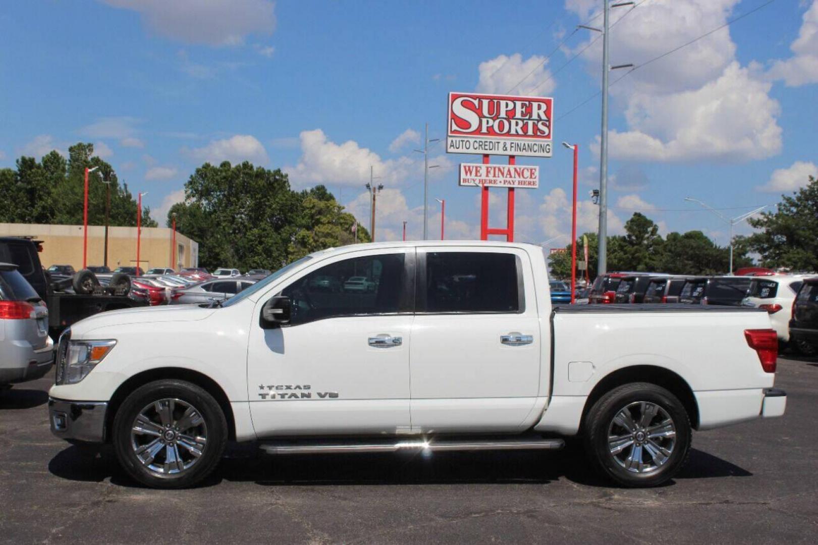 2018 White Nissan Titan Platinum Reserve Crew Cab 2WD (1N6AA1E68JN) with an 5.6L V8 DOHC 32V engine, 6A transmission, located at 4301 NW 39th , Oklahoma City, OK, 73112, (405) 949-5600, 35.512135, -97.598671 - NO DRIVERS LICENCE NO-FULL COVERAGE INSURANCE-NO CREDIT CHECK. COME ON OVER TO SUPERSPORTS AND TAKE A LOOK AND TEST DRIVE. PLEASE GIVE US A CALL AT (405) 949-5600. NO LICENSIA DE MANEJAR- NO SEGURO DE COBERTURA TOTAL- NO VERIFICACCION DE CREDITO. POR FAVOR VENGAN A SUPERSPORTS, ECHE UN - Photo#6