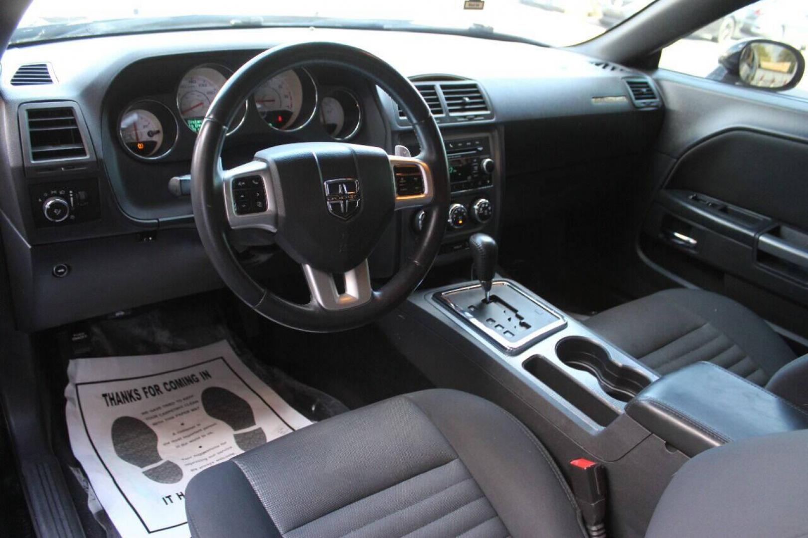 2014 Black Dodge Challenger R/T (2C3CDYBT8EH) with an 5.7L V8 OHV 16V engine, Automatic 5-Speed transmission, located at 4301 NW 39th , Oklahoma City, OK, 73112, (405) 949-5600, 35.512135, -97.598671 - NO DRIVERS LICENCE NO-FULL COVERAGE INSURANCE-NO CREDIT CHECK. COME ON OVER TO SUPERSPORTS AND TAKE A LOOK AND TEST DRIVE. PLEASE GIVE US A CALL AT (405) 949-5600. NO LICENSIA DE MANEJAR- NO SEGURO DE COBERTURA TOTAL- NO VERIFICACCION DE CREDITO. POR FAVOR VENGAN A SUPERSPORTS, ECHE UN - Photo#12