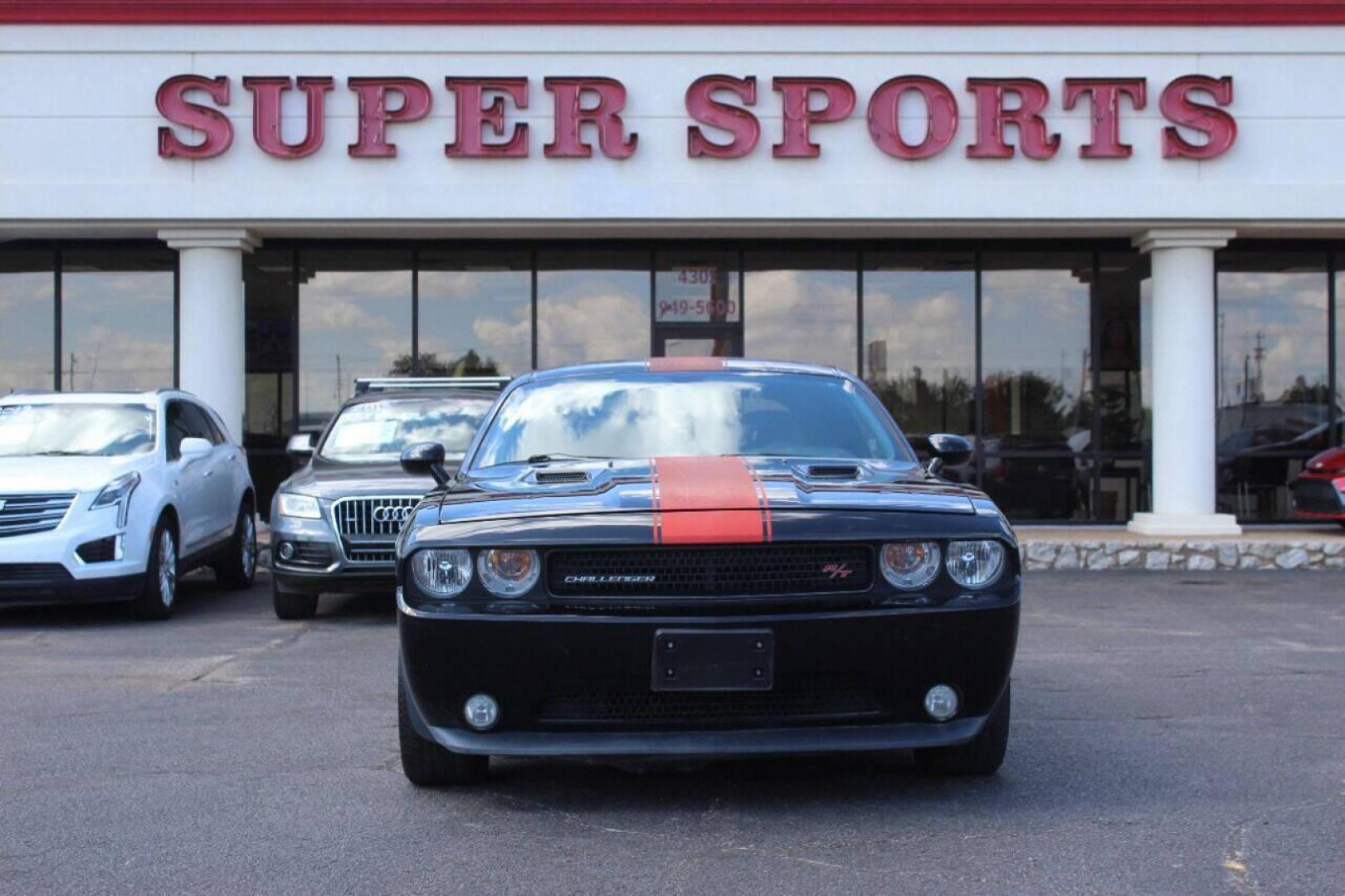 2014 Black Dodge Challenger R/T (2C3CDYBT8EH) with an 5.7L V8 OHV 16V engine, Automatic 5-Speed transmission, located at 4301 NW 39th , Oklahoma City, OK, 73112, (405) 949-5600, 35.512135, -97.598671 - NO DRIVERS LICENCE NO-FULL COVERAGE INSURANCE-NO CREDIT CHECK. COME ON OVER TO SUPERSPORTS AND TAKE A LOOK AND TEST DRIVE. PLEASE GIVE US A CALL AT (405) 949-5600. NO LICENSIA DE MANEJAR- NO SEGURO DE COBERTURA TOTAL- NO VERIFICACCION DE CREDITO. POR FAVOR VENGAN A SUPERSPORTS, ECHE UN - Photo#2