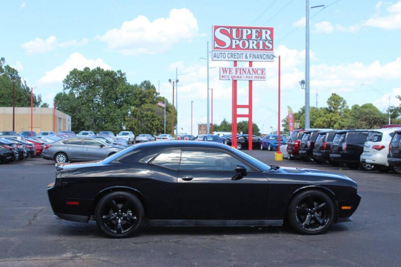 2014 Black Dodge Challenger R/T (2C3CDYBT8EH) with an 5.7L V8 OHV 16V engine, Automatic 5-Speed transmission, located at 4301 NW 39th , Oklahoma City, OK, 73112, (405) 949-5600, 35.512135, -97.598671 - NO DRIVERS LICENCE NO-FULL COVERAGE INSURANCE-NO CREDIT CHECK. COME ON OVER TO SUPERSPORTS AND TAKE A LOOK AND TEST DRIVE. PLEASE GIVE US A CALL AT (405) 949-5600. NO LICENSIA DE MANEJAR- NO SEGURO DE COBERTURA TOTAL- NO VERIFICACCION DE CREDITO. POR FAVOR VENGAN A SUPERSPORTS, ECHE UN - Photo#3