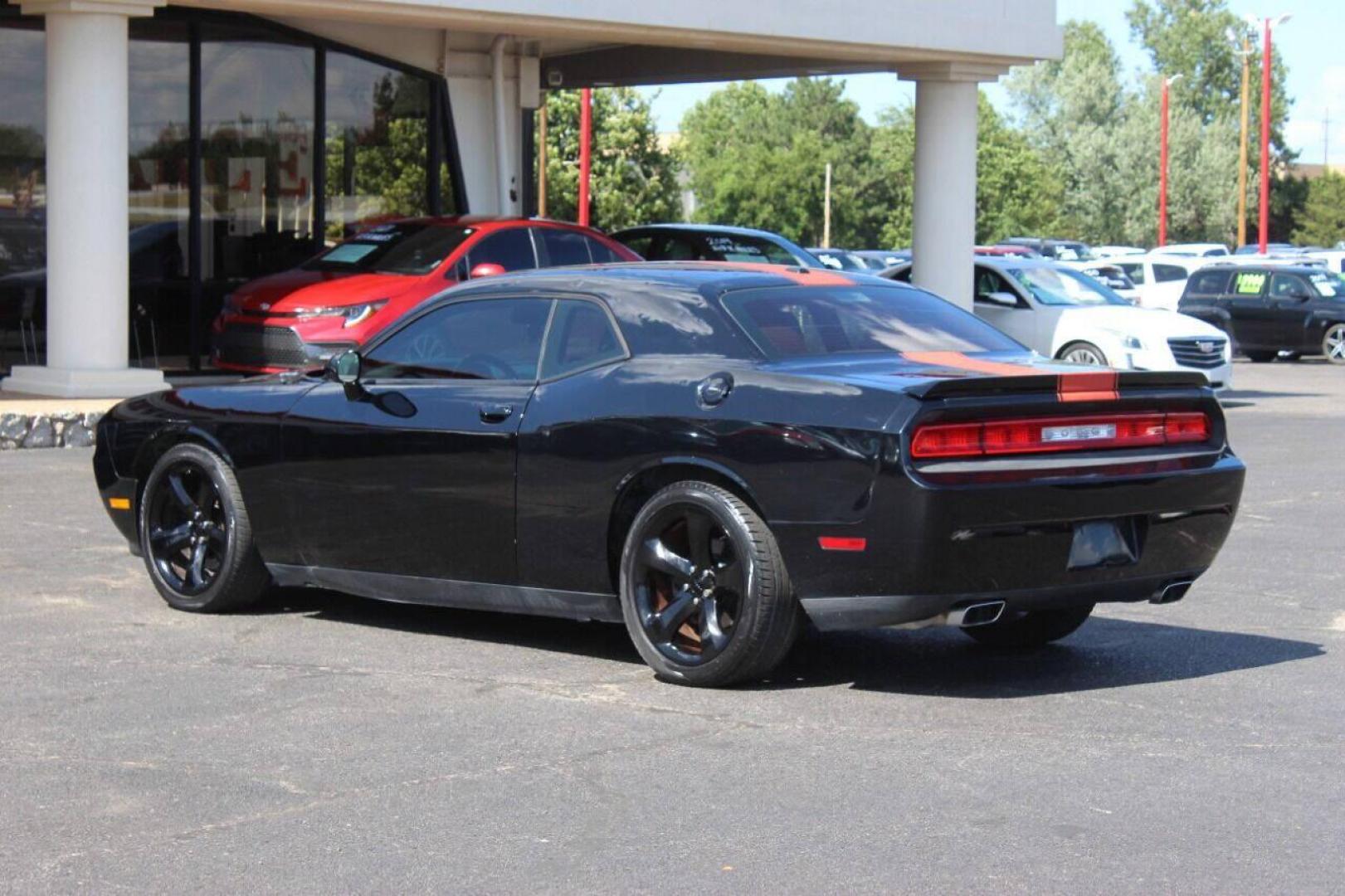 2014 Black Dodge Challenger R/T (2C3CDYBT8EH) with an 5.7L V8 OHV 16V engine, Automatic 5-Speed transmission, located at 4301 NW 39th , Oklahoma City, OK, 73112, (405) 949-5600, 35.512135, -97.598671 - NO DRIVERS LICENCE NO-FULL COVERAGE INSURANCE-NO CREDIT CHECK. COME ON OVER TO SUPERSPORTS AND TAKE A LOOK AND TEST DRIVE. PLEASE GIVE US A CALL AT (405) 949-5600. NO LICENSIA DE MANEJAR- NO SEGURO DE COBERTURA TOTAL- NO VERIFICACCION DE CREDITO. POR FAVOR VENGAN A SUPERSPORTS, ECHE UN - Photo#5