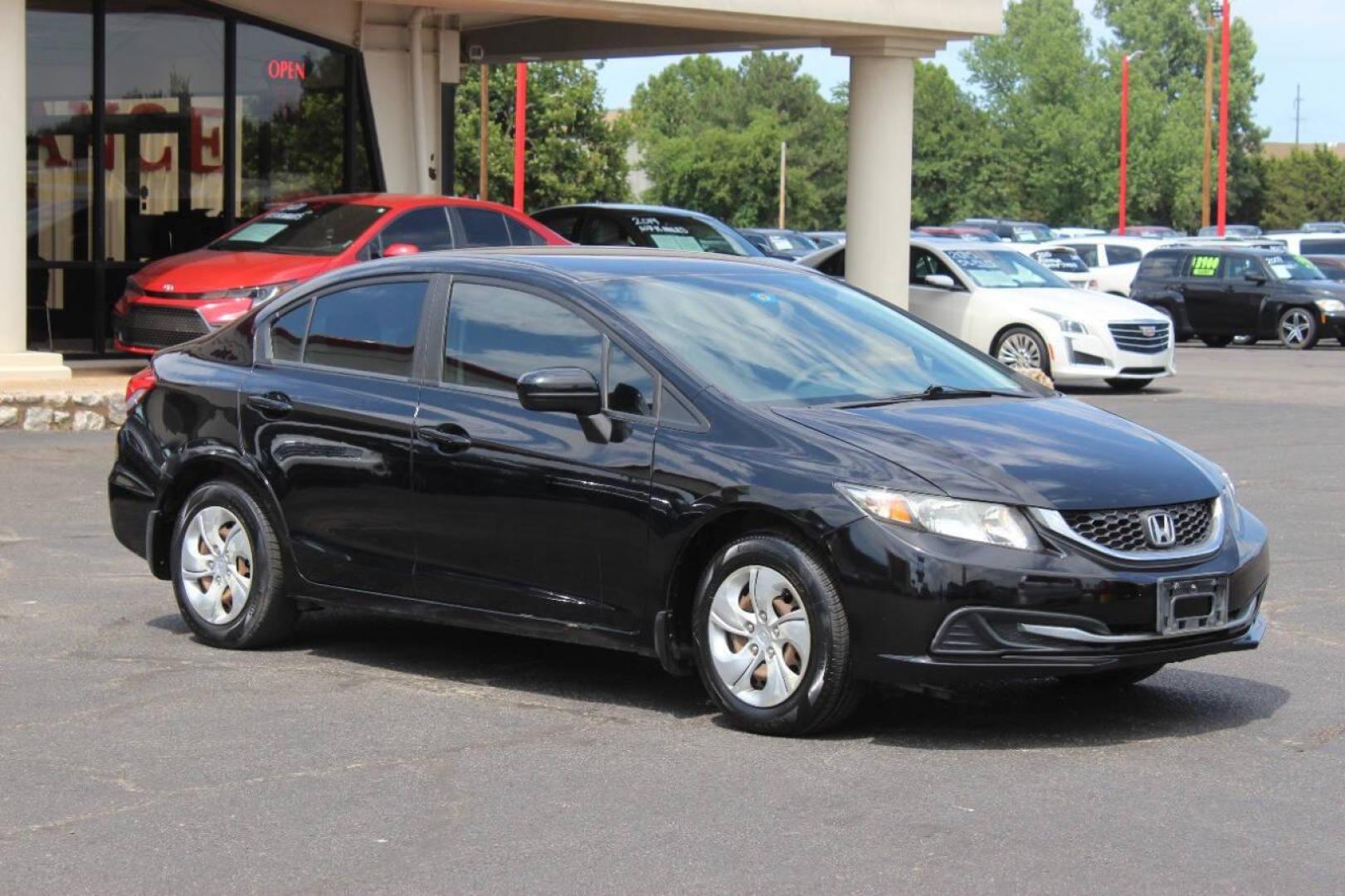 2014 Black Honda Civic LX Sedan CVT (19XFB2F57EE) with an 1.8L L4 SOHC 16V engine, Continuously Variable Transmission transmission, located at 4301 NW 39th , Oklahoma City, OK, 73112, (405) 949-5600, 35.512135, -97.598671 - NO DRIVERS LICENCE NO-FULL COVERAGE INSURANCE-NO CREDIT CHECK. COME ON OVER TO SUPERSPORTS AND TAKE A LOOK AND TEST DRIVE. PLEASE GIVE US A CALL AT (405) 949-5600. NO LICENSIA DE MANEJAR- NO SEGURO DE COBERTURA TOTAL- NO VERIFICACCION DE CREDITO. POR FAVOR VENGAN A SUPERSPORTS, ECHE UN - Photo#0