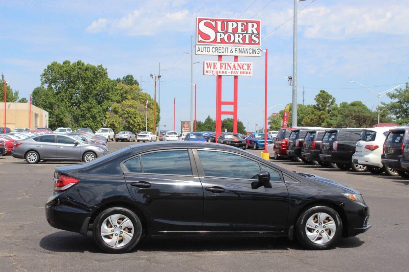 2014 Black Honda Civic LX Sedan CVT (19XFB2F57EE) with an 1.8L L4 SOHC 16V engine, Continuously Variable Transmission transmission, located at 4301 NW 39th , Oklahoma City, OK, 73112, (405) 949-5600, 35.512135, -97.598671 - NO DRIVERS LICENCE NO-FULL COVERAGE INSURANCE-NO CREDIT CHECK. COME ON OVER TO SUPERSPORTS AND TAKE A LOOK AND TEST DRIVE. PLEASE GIVE US A CALL AT (405) 949-5600. NO LICENSIA DE MANEJAR- NO SEGURO DE COBERTURA TOTAL- NO VERIFICACCION DE CREDITO. POR FAVOR VENGAN A SUPERSPORTS, ECHE UN - Photo#3