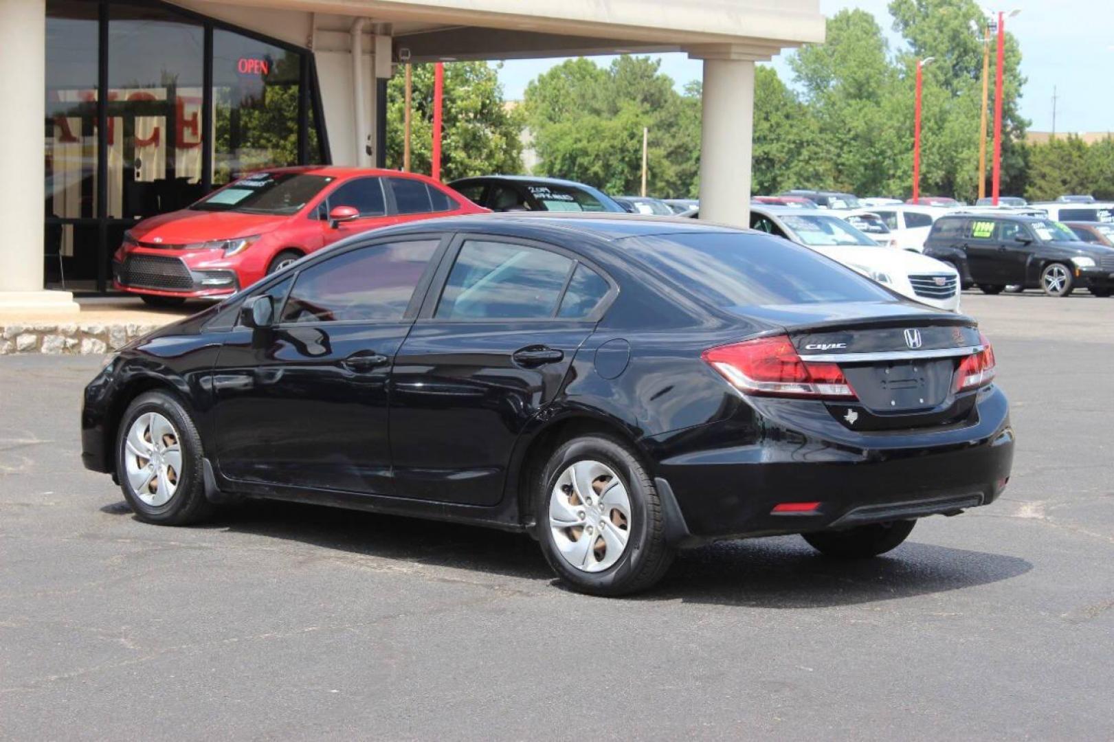 2014 Black Honda Civic LX Sedan CVT (19XFB2F57EE) with an 1.8L L4 SOHC 16V engine, Continuously Variable Transmission transmission, located at 4301 NW 39th , Oklahoma City, OK, 73112, (405) 949-5600, 35.512135, -97.598671 - NO DRIVERS LICENCE NO-FULL COVERAGE INSURANCE-NO CREDIT CHECK. COME ON OVER TO SUPERSPORTS AND TAKE A LOOK AND TEST DRIVE. PLEASE GIVE US A CALL AT (405) 949-5600. NO LICENSIA DE MANEJAR- NO SEGURO DE COBERTURA TOTAL- NO VERIFICACCION DE CREDITO. POR FAVOR VENGAN A SUPERSPORTS, ECHE UN - Photo#5