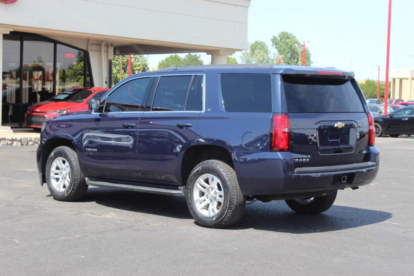 2017 Blue Chevrolet Tahoe LT 4WD (1GNSKBKC4HR) with an 5.3L V8 OHV 16V engine, 6A transmission, located at 4301 NW 39th , Oklahoma City, OK, 73112, (405) 949-5600, 35.512135, -97.598671 - NO DRIVERS LICENCE NO-FULL COVERAGE INSURANCE-NO CREDIT CHECK. COME ON OVER TO SUPERSPORTS AND TAKE A LOOK AND TEST DRIVE. PLEASE GIVE US A CALL AT (405) 949-5600. NO LICENSIA DE MANEJAR- NO SEGURO DE COBERTURA TOTAL- NO VERIFICACCION DE CREDITO. POR FAVOR VENGAN A SUPERSPORTS, ECHE UN - Photo#5