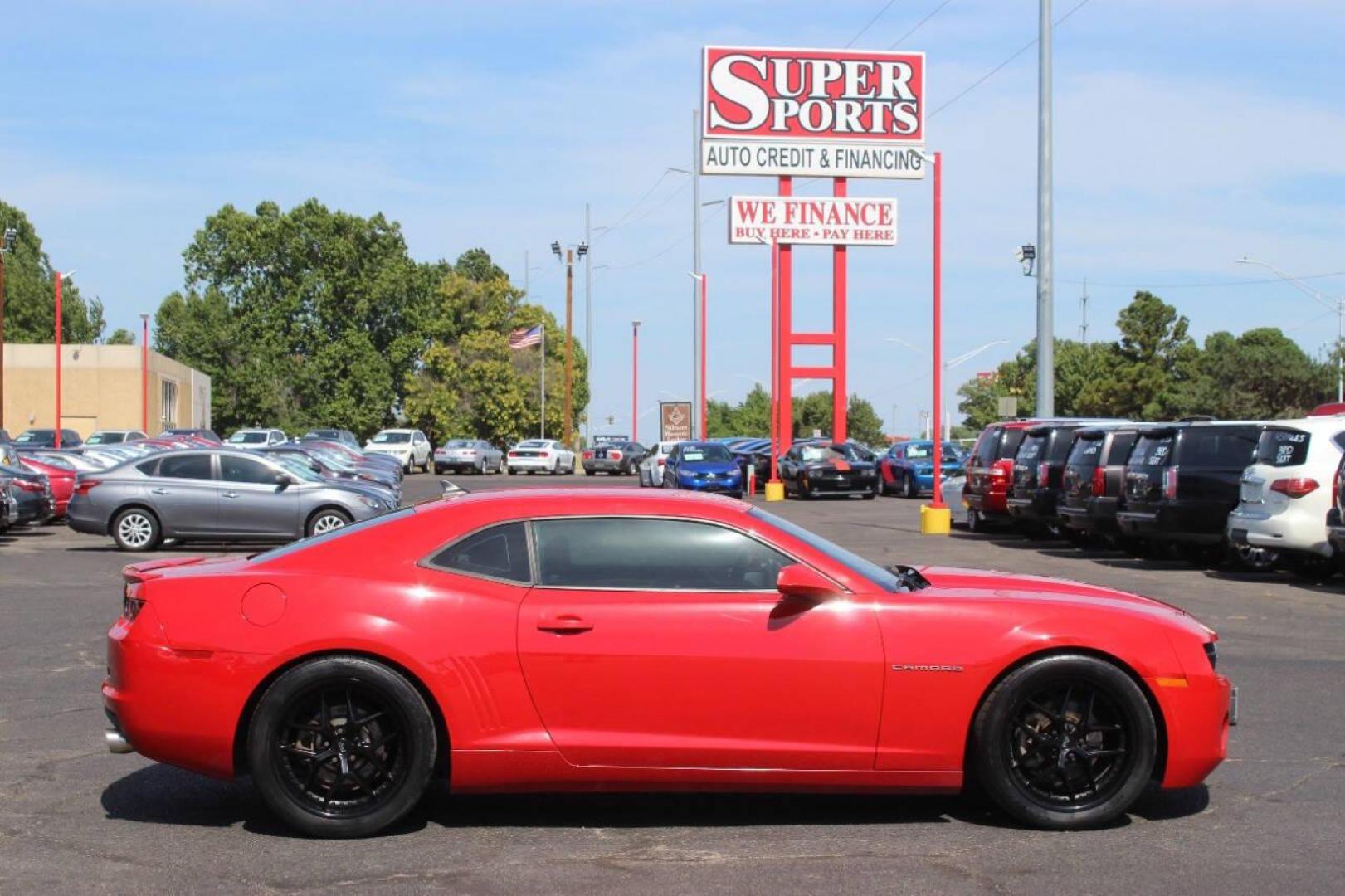 2013 Red Chevrolet Camaro LS Coupe (2G1FA1E3XD9) with an 3.6L V6 DOHC 24V FFV engine, 6-Speed Automatic transmission, located at 4301 NW 39th , Oklahoma City, OK, 73112, (405) 949-5600, 35.512135, -97.598671 - NO DRIVERS LICENCE NO-FULL COVERAGE INSURANCE-NO CREDIT CHECK. COME ON OVER TO SUPERSPORTS AND TAKE A LOOK AND TEST DRIVE PLEASE GIVE US A CALL AT (405) 949-5600. NO LICENSIA DE MANEJAR- NO SEGURO DE COBERTURA TOTAL- NO VERIFICACCION DE CREDITO. POR FAVOR VENGAN A SUPERSPORTS, ECHE UN VI - Photo#3