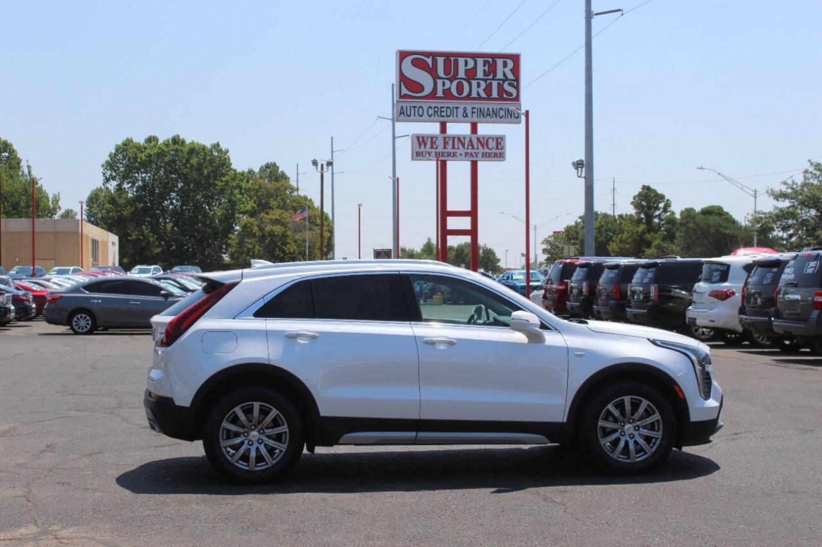 2021 White Cadillac XT4 Premium Luxury AWD (1GYFZDR46MF) with an 2.0L L4 DOHC 16V engine, 9A transmission, located at 4301 NW 39th , Oklahoma City, OK, 73112, (405) 949-5600, 35.512135, -97.598671 - NO DRIVERS LICENCE NO-FULL COVERAGE INSURANCE-NO CREDIT CHECK. COME ON OVER TO SUPERSPORTS AND TAKE A LOOK AND TEST DRIVE. PLEASE GIVE US A CALL AT (405) 949-5600. NO LICENSIA DE MANEJAR- NO SEGURO DE COBERTURA TOTAL- NO VERIFICACCION DE CREDITO. POR FAVOR VENGAN A SUPERSPORTS, ECHE UN - Photo#3