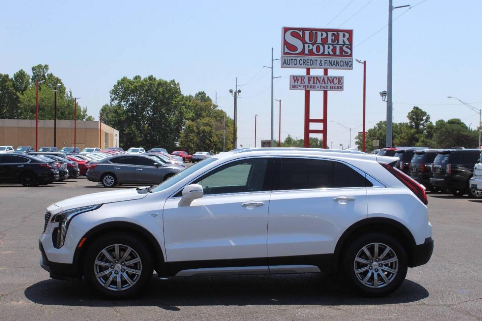 2021 White Cadillac XT4 Premium Luxury AWD (1GYFZDR46MF) with an 2.0L L4 DOHC 16V engine, 9A transmission, located at 4301 NW 39th , Oklahoma City, OK, 73112, (405) 949-5600, 35.512135, -97.598671 - NO DRIVERS LICENCE NO-FULL COVERAGE INSURANCE-NO CREDIT CHECK. COME ON OVER TO SUPERSPORTS AND TAKE A LOOK AND TEST DRIVE. PLEASE GIVE US A CALL AT (405) 949-5600. NO LICENSIA DE MANEJAR- NO SEGURO DE COBERTURA TOTAL- NO VERIFICACCION DE CREDITO. POR FAVOR VENGAN A SUPERSPORTS, ECHE UN - Photo#6