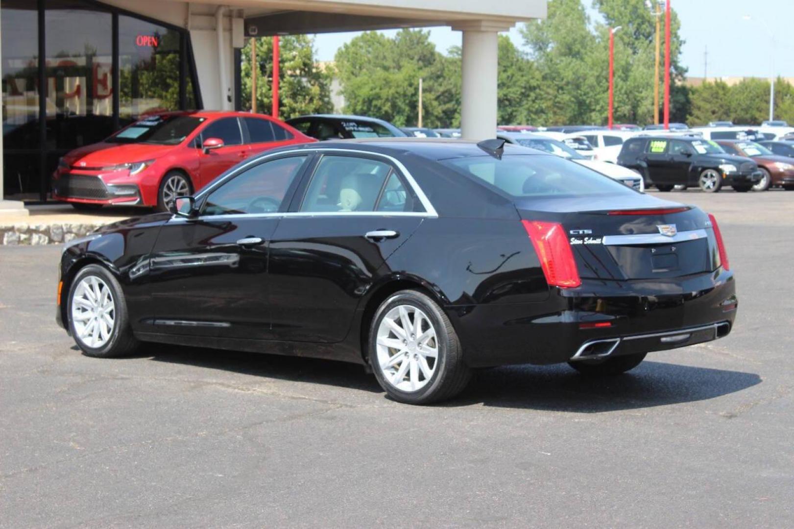 2016 Black Cadillac CTS 2.0L Turbo RWD (1G6AP5SX3G0) with an 2.0L L4 DOHC 24V TURBO engine, 6A transmission, located at 4301 NW 39th , Oklahoma City, OK, 73112, (405) 949-5600, 35.512135, -97.598671 - NO DRIVERS LICENCE NO-FULL COVERAGE INSURANCE-NO CREDIT CHECK. COME ON OVER TO SUPERSPORTS AND TAKE A LOOK AND TEST DRIVE PLEASE GIVE US A CALL AT (405) 949-5600. NO LICENSIA DE MANEJAR- NO SEGURO DE COBERTURA TOTAL- NO VERIFICACCION DE CREDITO. POR FAVOR VENGAN A SUPERSPORTS, ECHE UN VI - Photo#5