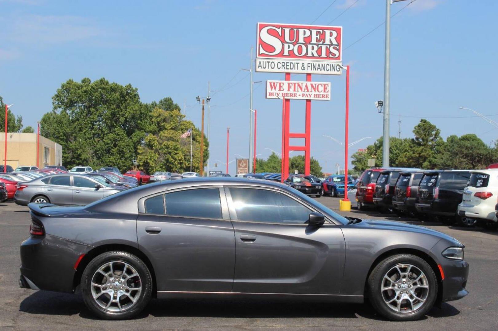 2016 Gray Dodge Charger SXT AWD (2C3CDXJG4GH) with an 3.6L V6 DOHC 24V engine, 8A transmission, located at 4301 NW 39th , Oklahoma City, OK, 73112, (405) 949-5600, 35.512135, -97.598671 - Photo#3