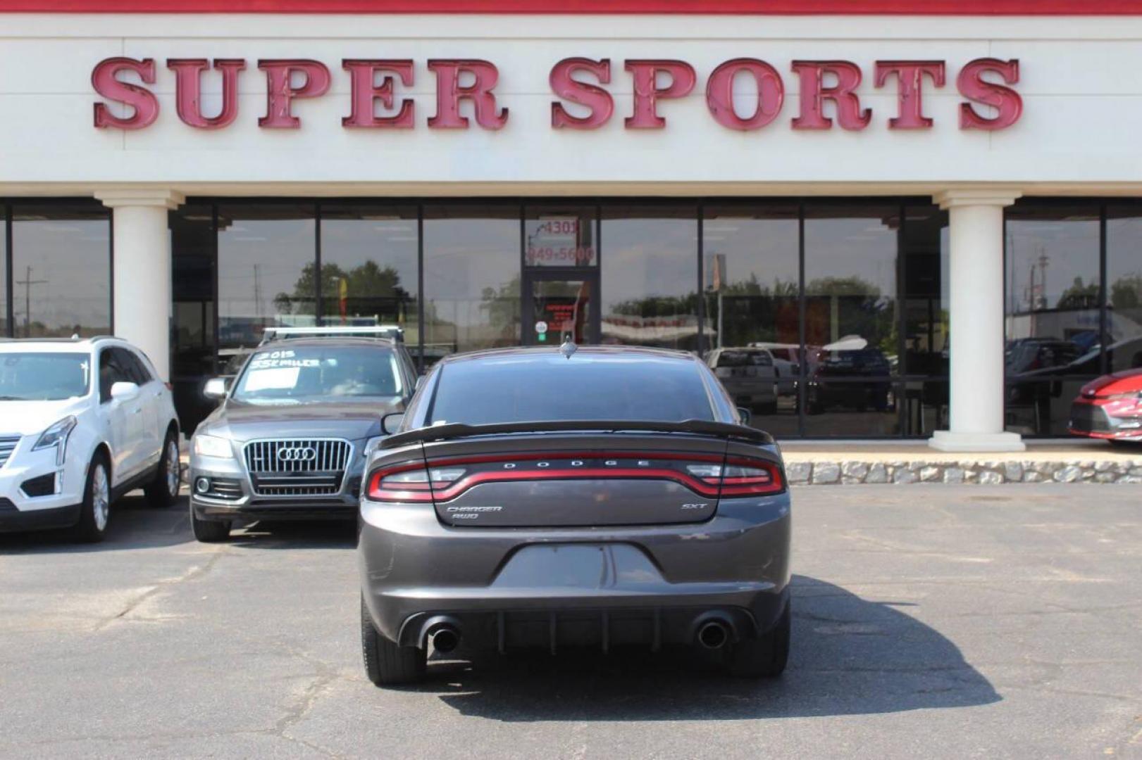 2016 Gray Dodge Charger SXT AWD (2C3CDXJG4GH) with an 3.6L V6 DOHC 24V engine, 8A transmission, located at 4301 NW 39th , Oklahoma City, OK, 73112, (405) 949-5600, 35.512135, -97.598671 - Photo#4