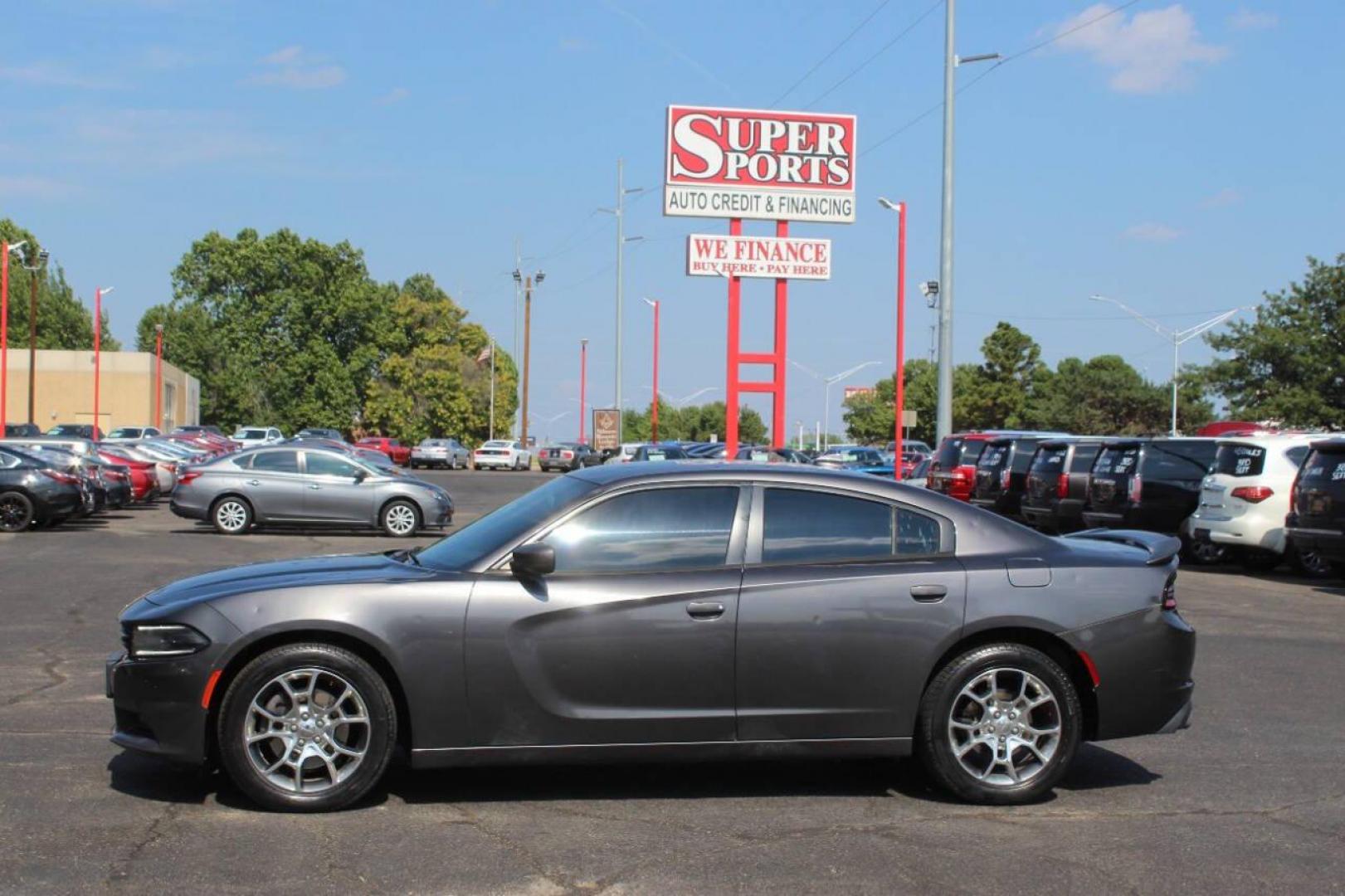 2016 Gray Dodge Charger SXT AWD (2C3CDXJG4GH) with an 3.6L V6 DOHC 24V engine, 8A transmission, located at 4301 NW 39th , Oklahoma City, OK, 73112, (405) 949-5600, 35.512135, -97.598671 - Photo#6