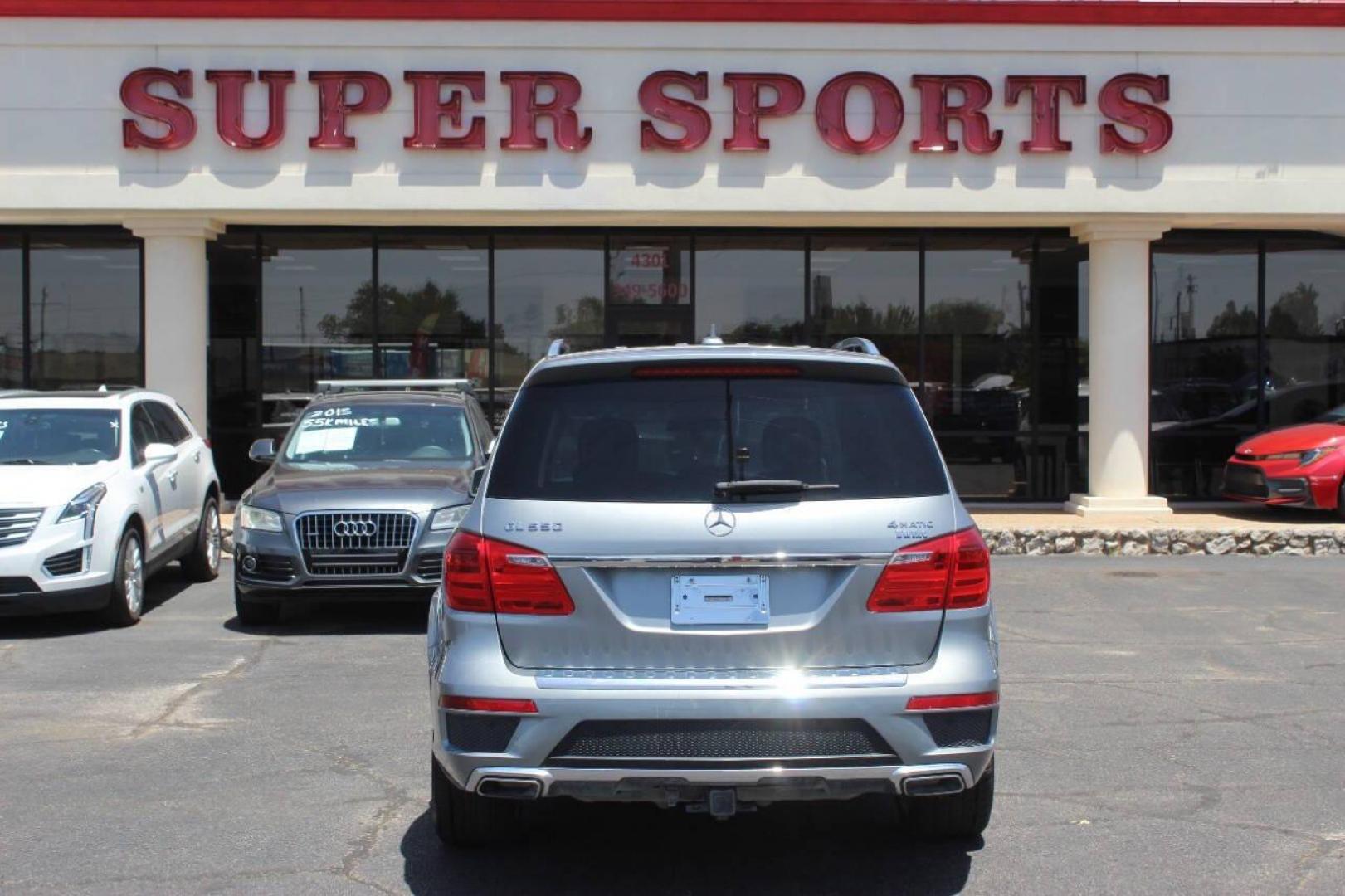 2015 Gray Mercedes-Benz GL-Class GL550 4MATIC (4JGDF7DE4FA) with an 4.7L V8 DOHC 32V engine, 7-Speed Automatic transmission, located at 4301 NW 39th , Oklahoma City, OK, 73112, (405) 949-5600, 35.512135, -97.598671 - Photo#4