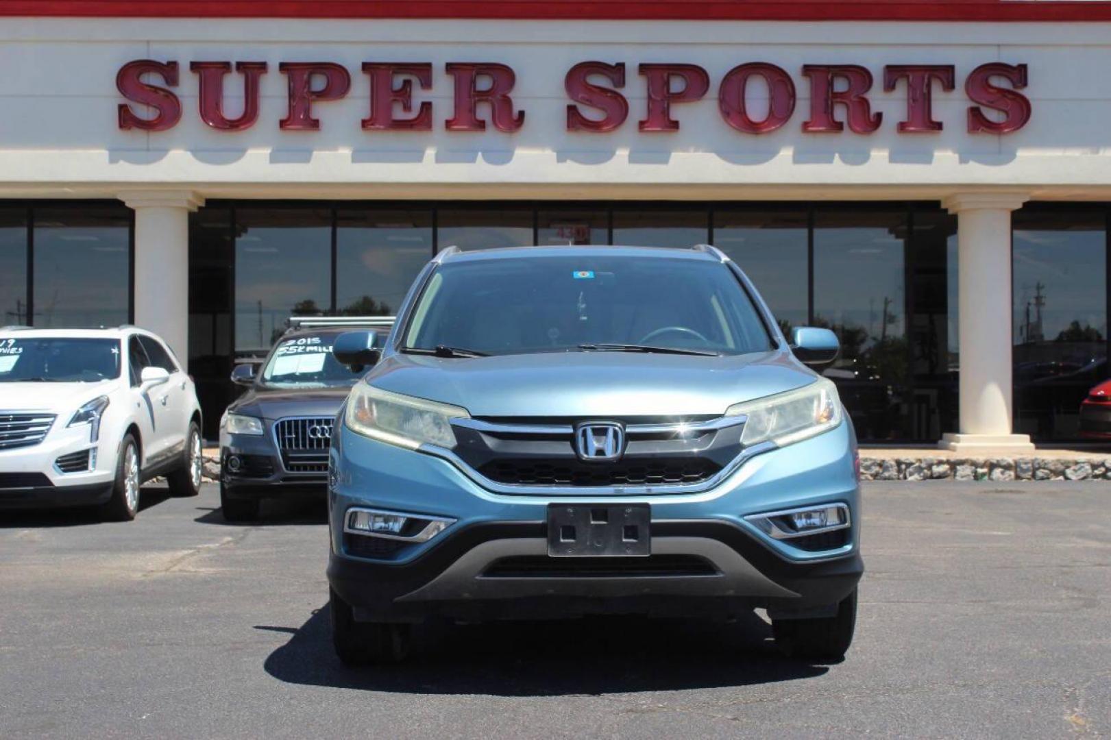 2016 Teal Honda CR-V EX-L AWD (2HKRM4H75GH) with an 2.4L L4 DOHC 16V engine, CVT transmission, located at 4301 NW 39th , Oklahoma City, OK, 73112, (405) 949-5600, 35.512135, -97.598671 - NO DRIVERS LICENCE NO-FULL COVERAGE INSURANCE-NO CREDIT CHECK. COME ON OVER TO SUPERSPORTS AND TAKE A LOOK AND TEST DRIVE. PLEASE GIVE US A CALL AT (405) 949-5600. NO LICENSIA DE MANEJAR- NO SEGURO DE COBERTURA TOTAL- NO VERIFICACCION DE CREDITO. POR FAVOR VENGAN A SUPERSPORTS, ECHE UN - Photo#2