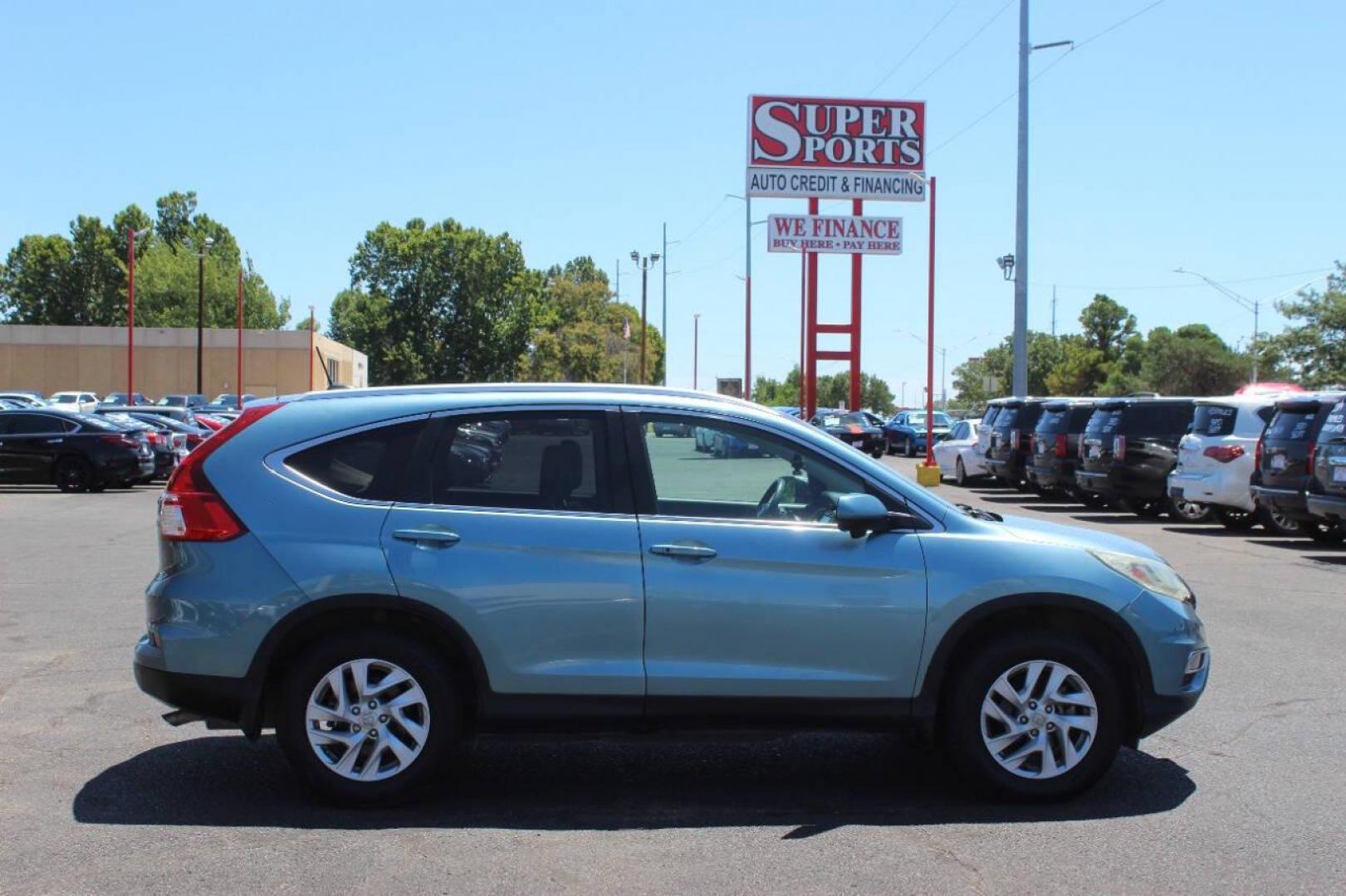 2016 Teal Honda CR-V EX-L AWD (2HKRM4H75GH) with an 2.4L L4 DOHC 16V engine, CVT transmission, located at 4301 NW 39th , Oklahoma City, OK, 73112, (405) 949-5600, 35.512135, -97.598671 - NO DRIVERS LICENCE NO-FULL COVERAGE INSURANCE-NO CREDIT CHECK. COME ON OVER TO SUPERSPORTS AND TAKE A LOOK AND TEST DRIVE. PLEASE GIVE US A CALL AT (405) 949-5600. NO LICENSIA DE MANEJAR- NO SEGURO DE COBERTURA TOTAL- NO VERIFICACCION DE CREDITO. POR FAVOR VENGAN A SUPERSPORTS, ECHE UN - Photo#3